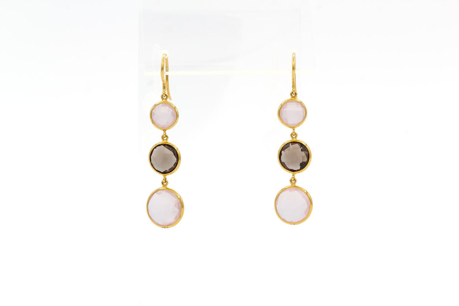 We are pleased to offer these Brand New Unworn Tresor 18k Yellow Gold Rose & Smokey Cabochon Rose Cut Quartz Dangle Drop Earrings. These stunning earrings are fun and vibrant! They feature 15.23ctw rose & smokey quartz stones set in 18k yellow gold