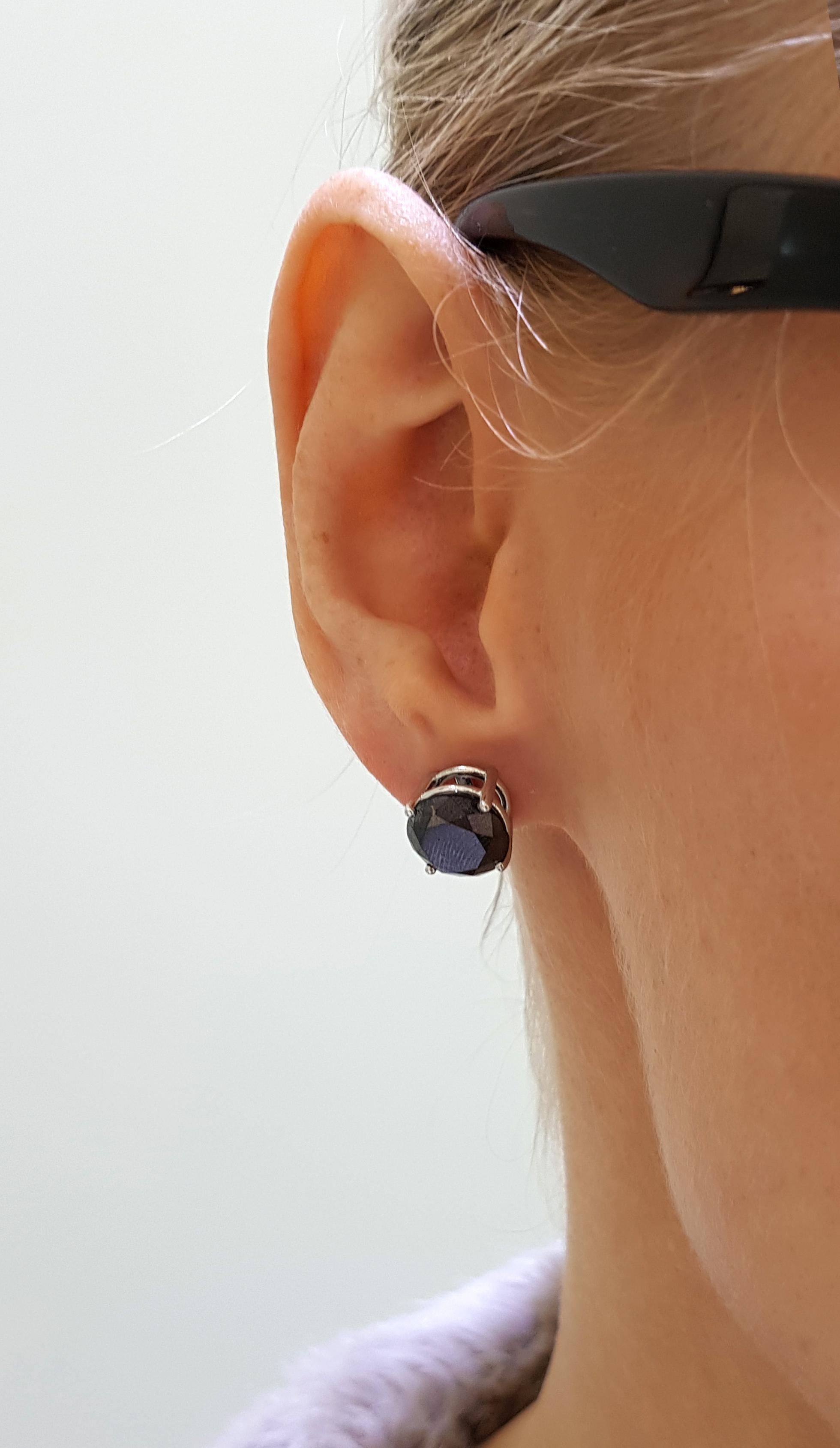 These striking 8.74 Carat Black Diamond solitaire Stud Earrings set in 18 Karat White Gold with 4 claws. Perfect pair for any occasion. Available in other Carat sizes upon the request. British Hallmarked by the London Assay Office.

Black diamonds
