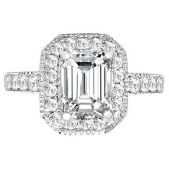 Tresor Paris Bespoke Halo Mount Emerald Shape Round Diamond Engagement Ring