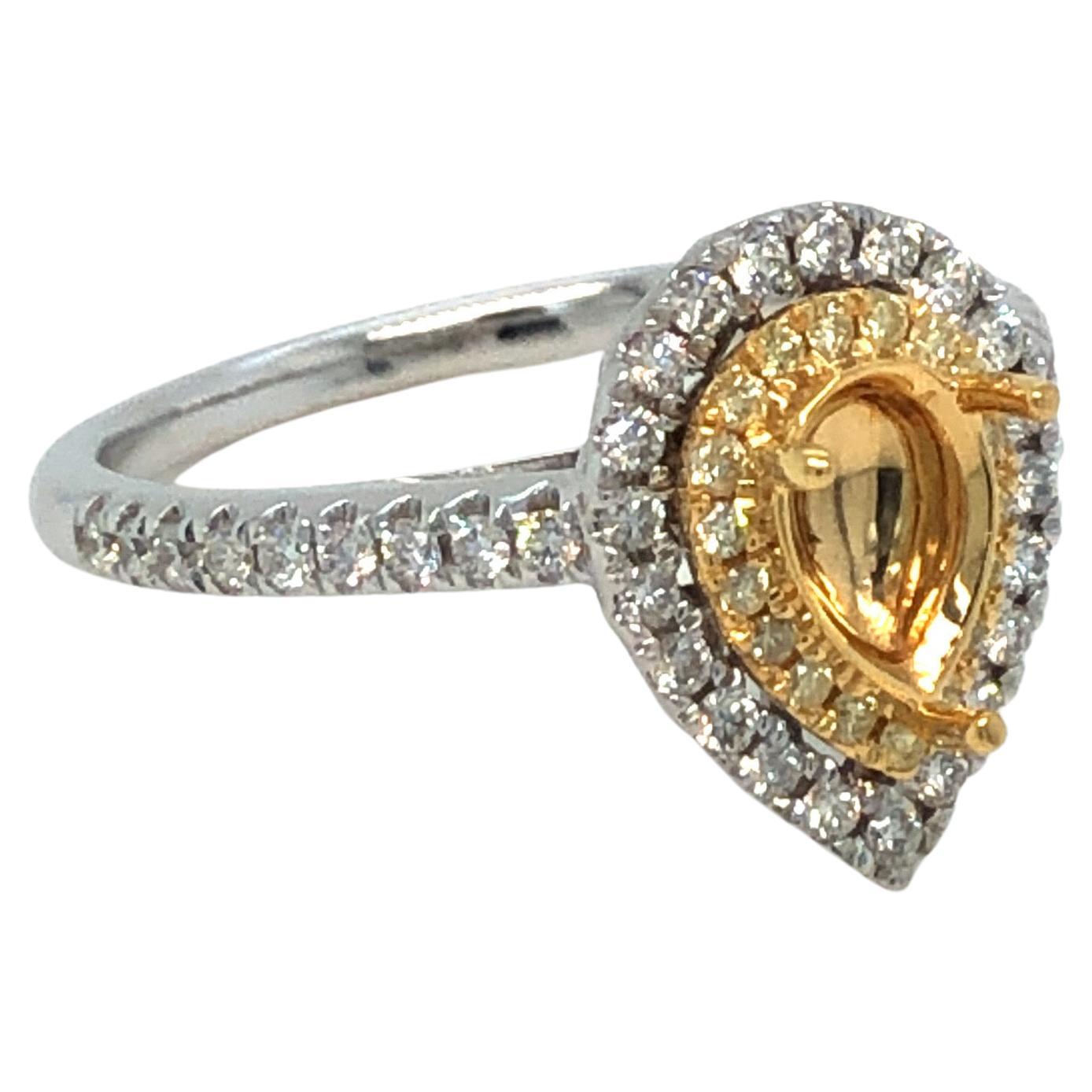 An extremely impressive bespoke ring mount only Ideal for a 0.70 - 0.90 ( 7x5 mm) Carat Natural Fancy Yellow or other coloured gemstone or diamond. For a Pear Shaped Diamond which is set in the centre of the Ring with Double Halo, the inner halo