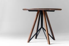 Trestle Dining Table – Solid Walnut with Black Powder-Coated Steel Base