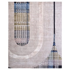 Tapis contemporain TRESTLE noué à la main de couleurs rouille et bleu par Hands