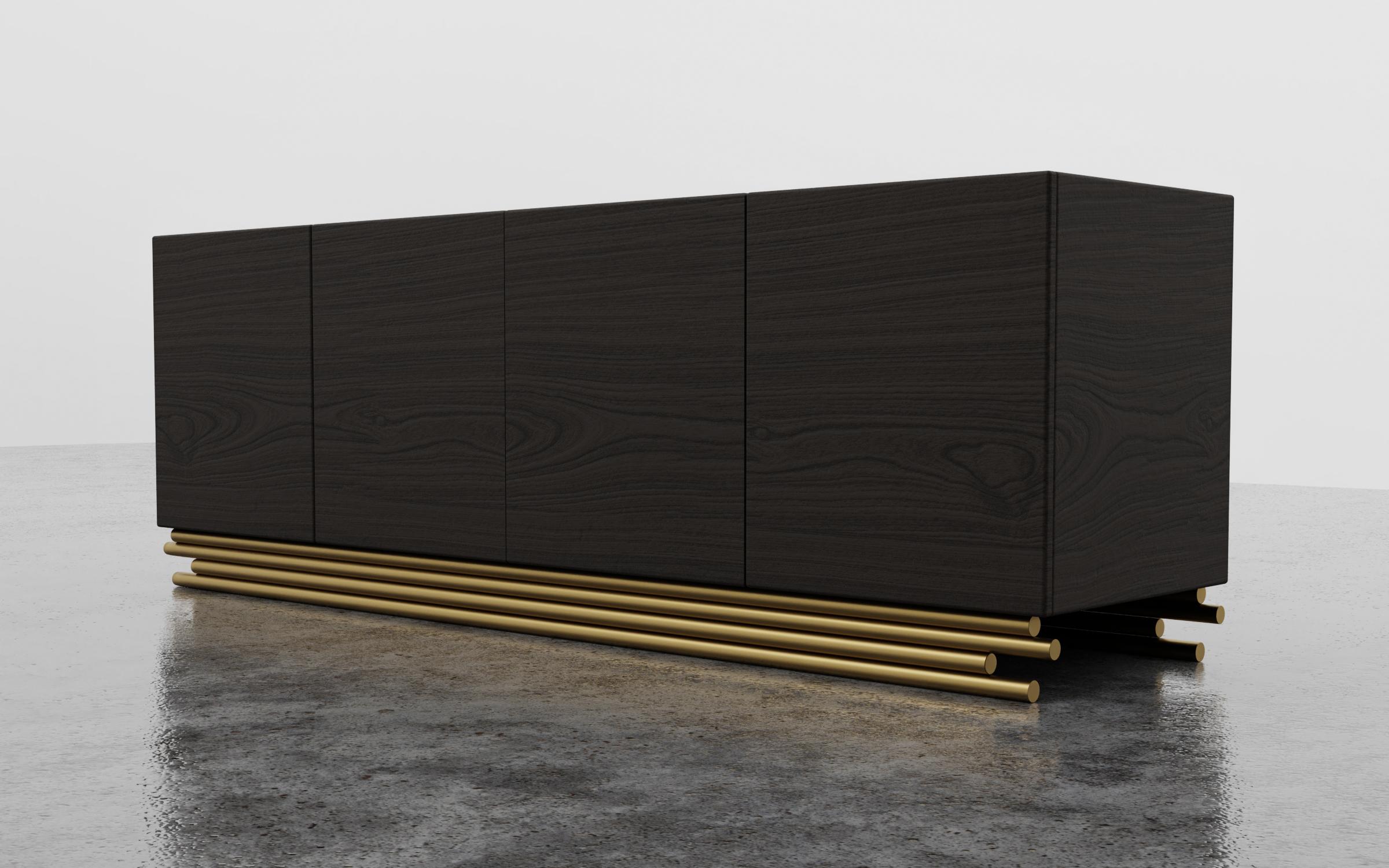 TRESTLES CREDENZA - Modern Ebony Walnut Cabinet with Metallic Lacquer Metal Base

The Trestles Credenza is a beautifully crafted piece of furniture that combines clean modern lines with a touch of sculptural elegance. Its sleek design features a