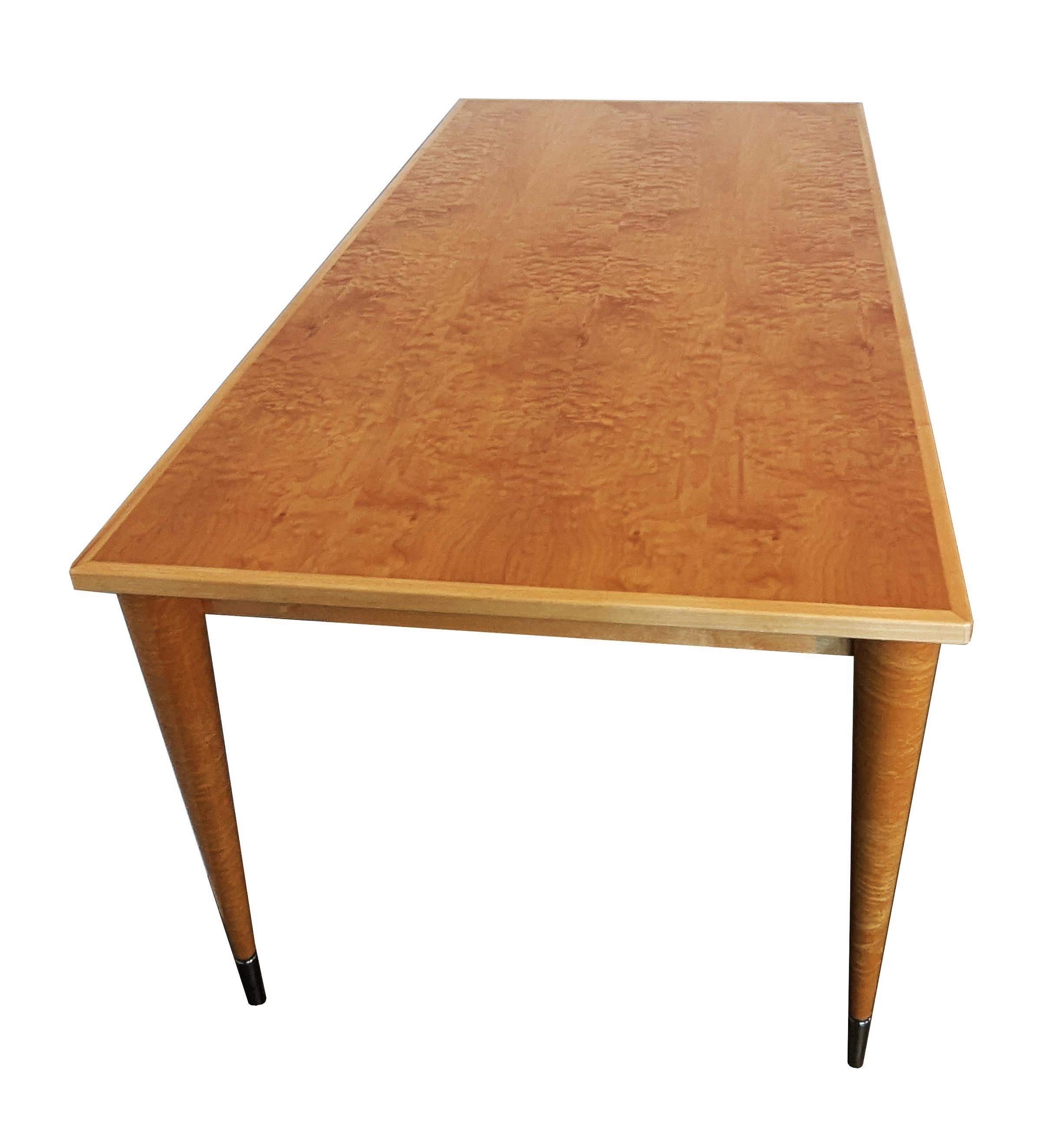 The Treveglio Dining Table

An elegant and relaxed Dining Table featuring a visually stunning Canadian Maple top. This veneer exhibits a unique and highly prised figure characterised by a distinctive quilted pattern that resembles a patchwork of