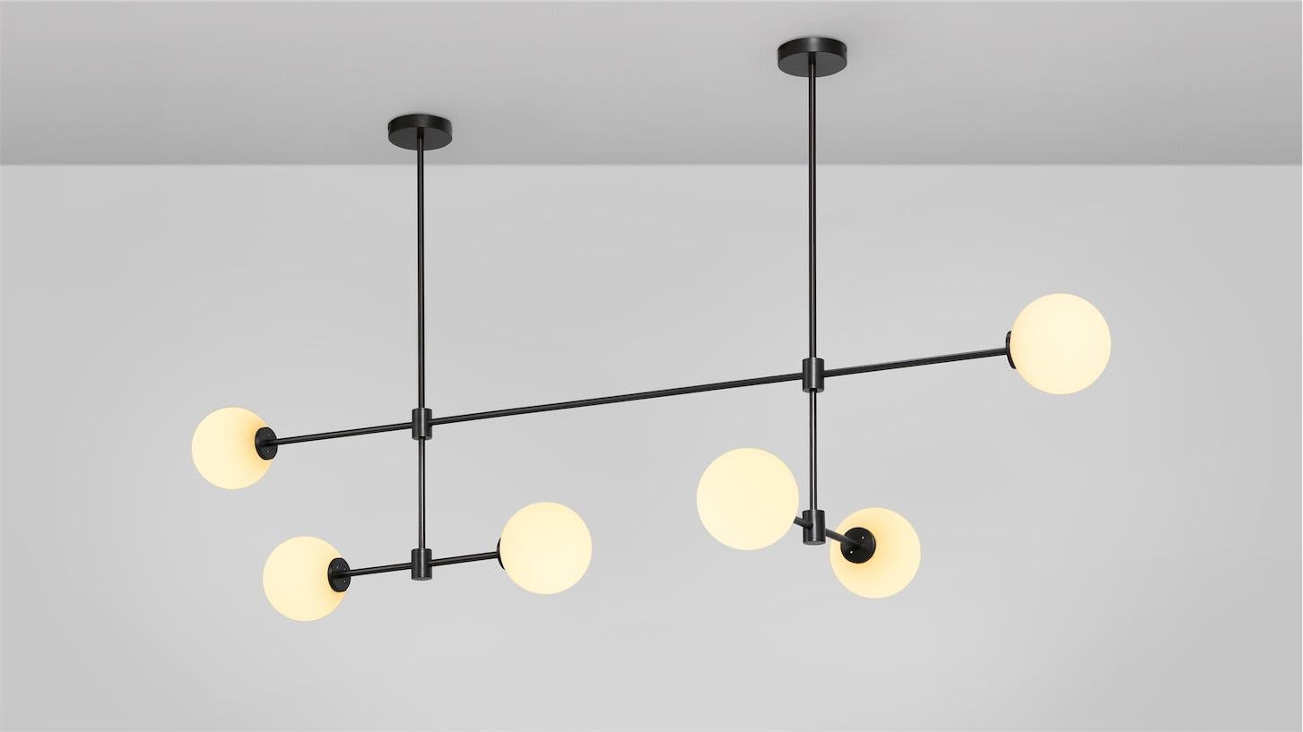 Trevi multi arm 6 pendant by CTO Lighting
Materials: Bronze with matt opal glass shades.
Dimensions: D 64 x W 169 x H 40 cm
Also available in satin brass with matt opal glass shades.

A grand statement of graphic precision, the Multi-arm Trevi is a