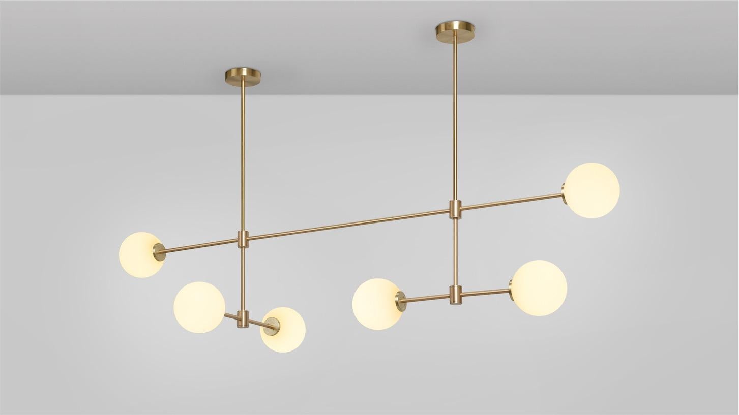 Trevi multi arm 6 pendant by CTO Lighting
Materials: satin brass with matt opal glass shades.
Dimensions: D 64 x W 169 x H 40 cm
Also available in dark bronze with matt opal glass shades.

A grand statement of graphic precision, the Multi-arm Trevi