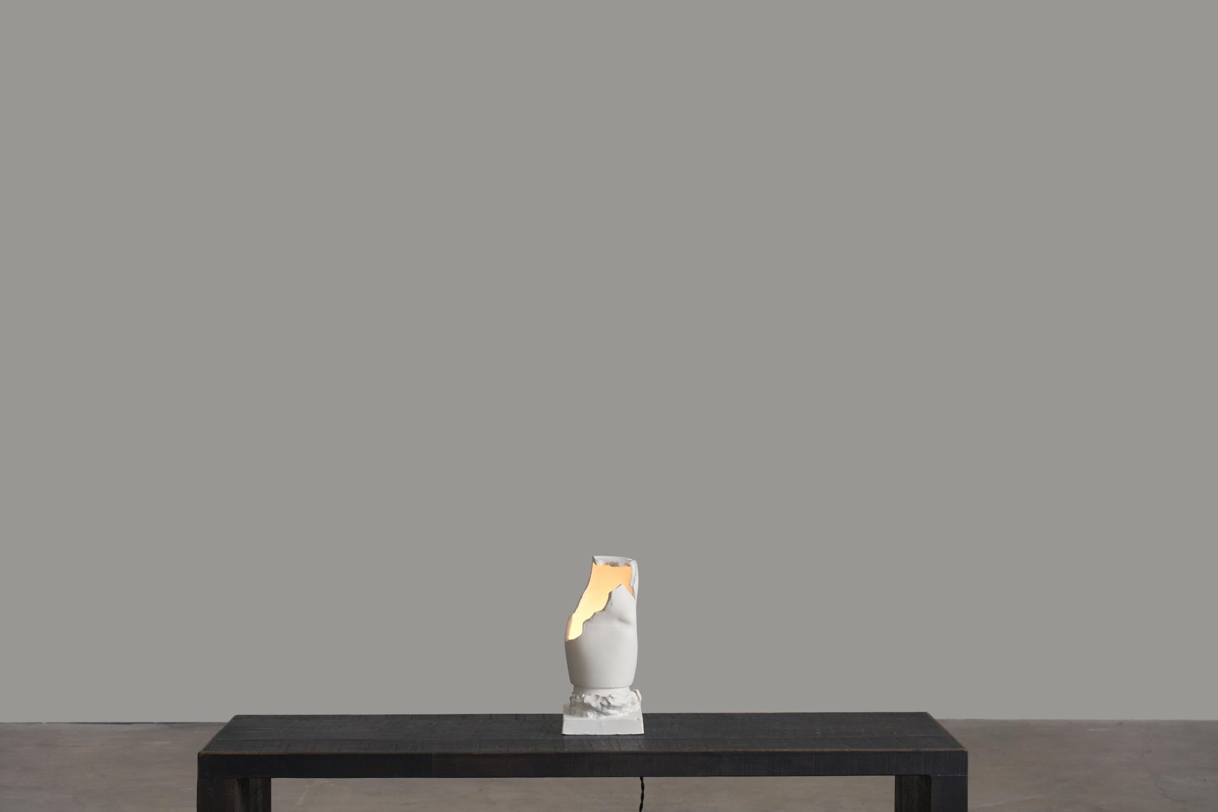 Treviso Table Lamp by Jenna Basso Pietrobon
Dimensions: W 15 x D 15 x H 29 cm
Materials: Ceramic.

Jenna Basso Pietrobon, born in 1986, is an artist whose work delves into societal issues through the lens of her personal experiences. She offers an