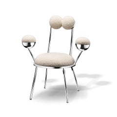 Trevor Chair with Armrests Chrome Finish Steel Frame in Bouclé by Lara Bohinc