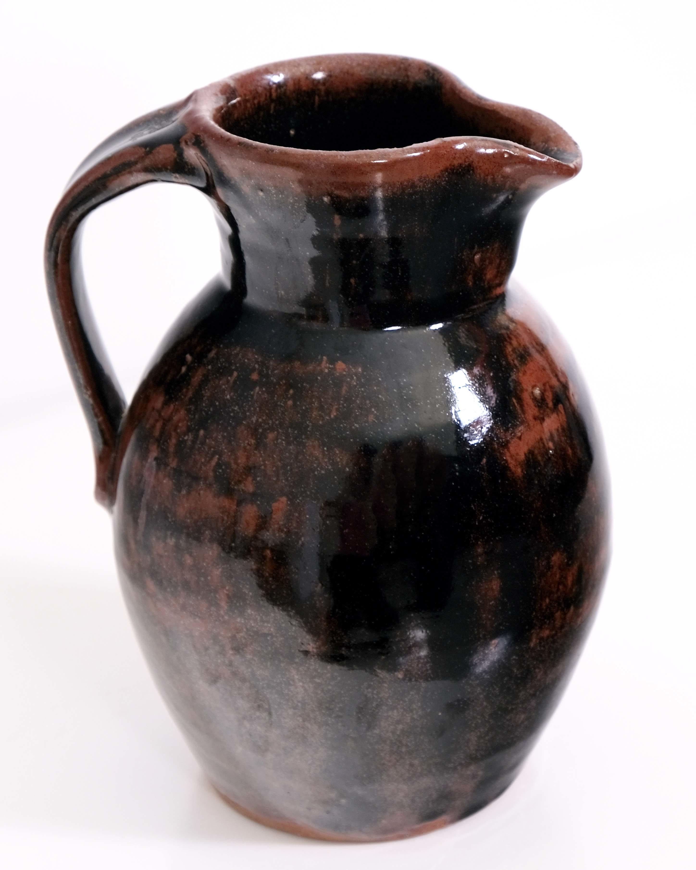 Tenmoku glazed stoneware with makers mark
H22 cm
