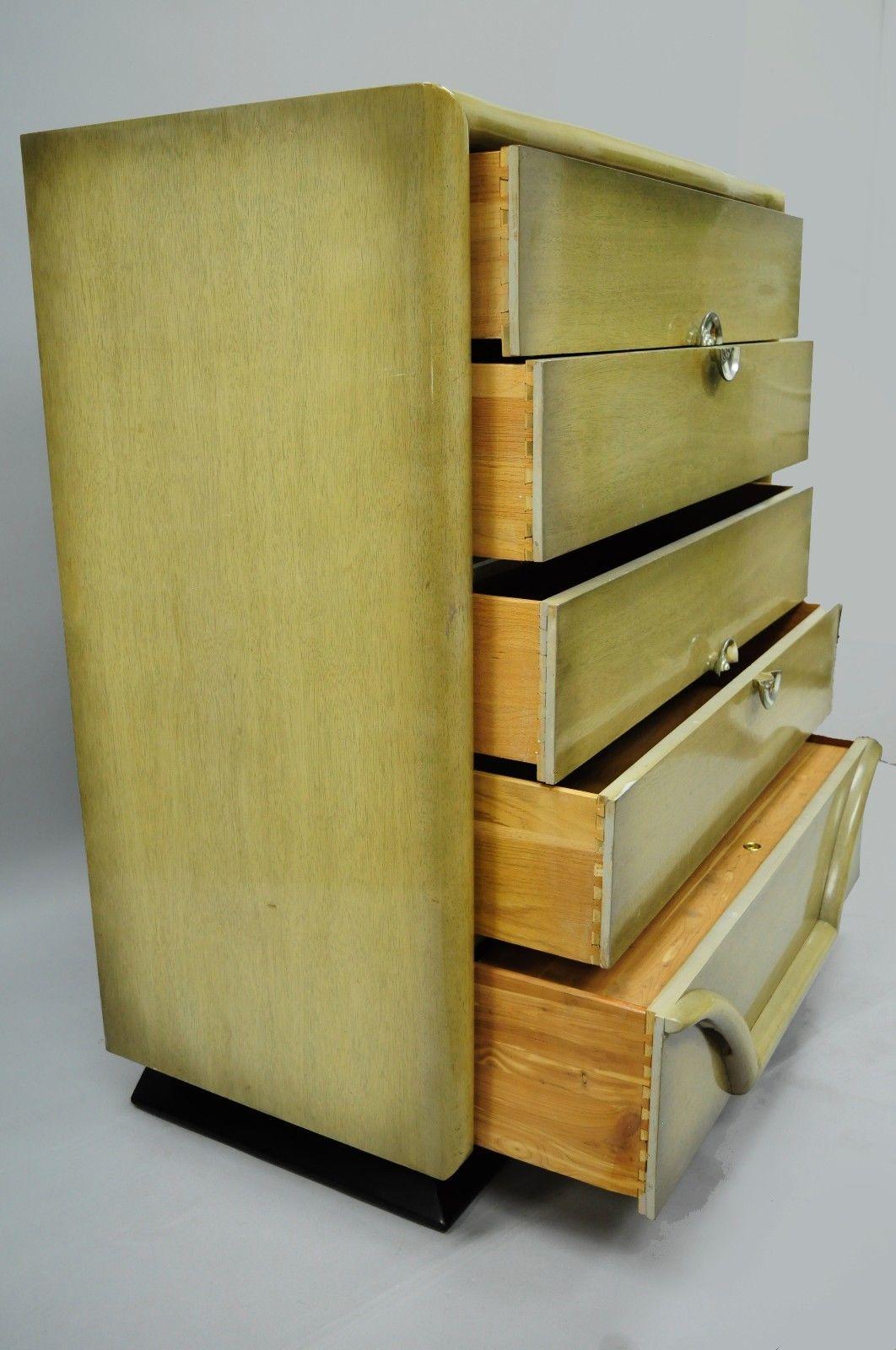 Vintage Mid-Century Modern bone color chest by Tri-Bond. Item features cedar-lined lower drawer, heavy wood construction, mahogany wood veneer, bone color finish, original label, five dovetail constructed drawers, quality American craftsmanship,