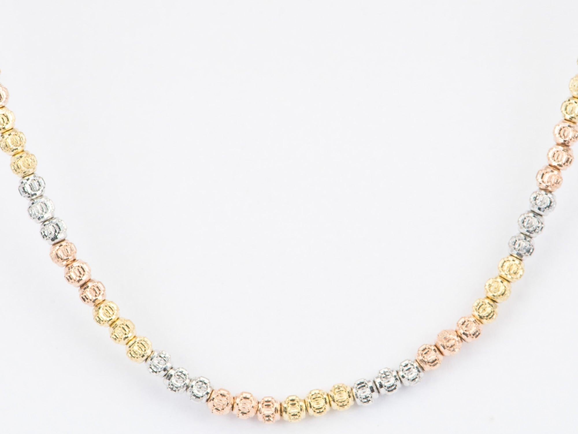 Dreifarbige Perlenkette aus 18 Karat Gold mit Diamantschliff 1