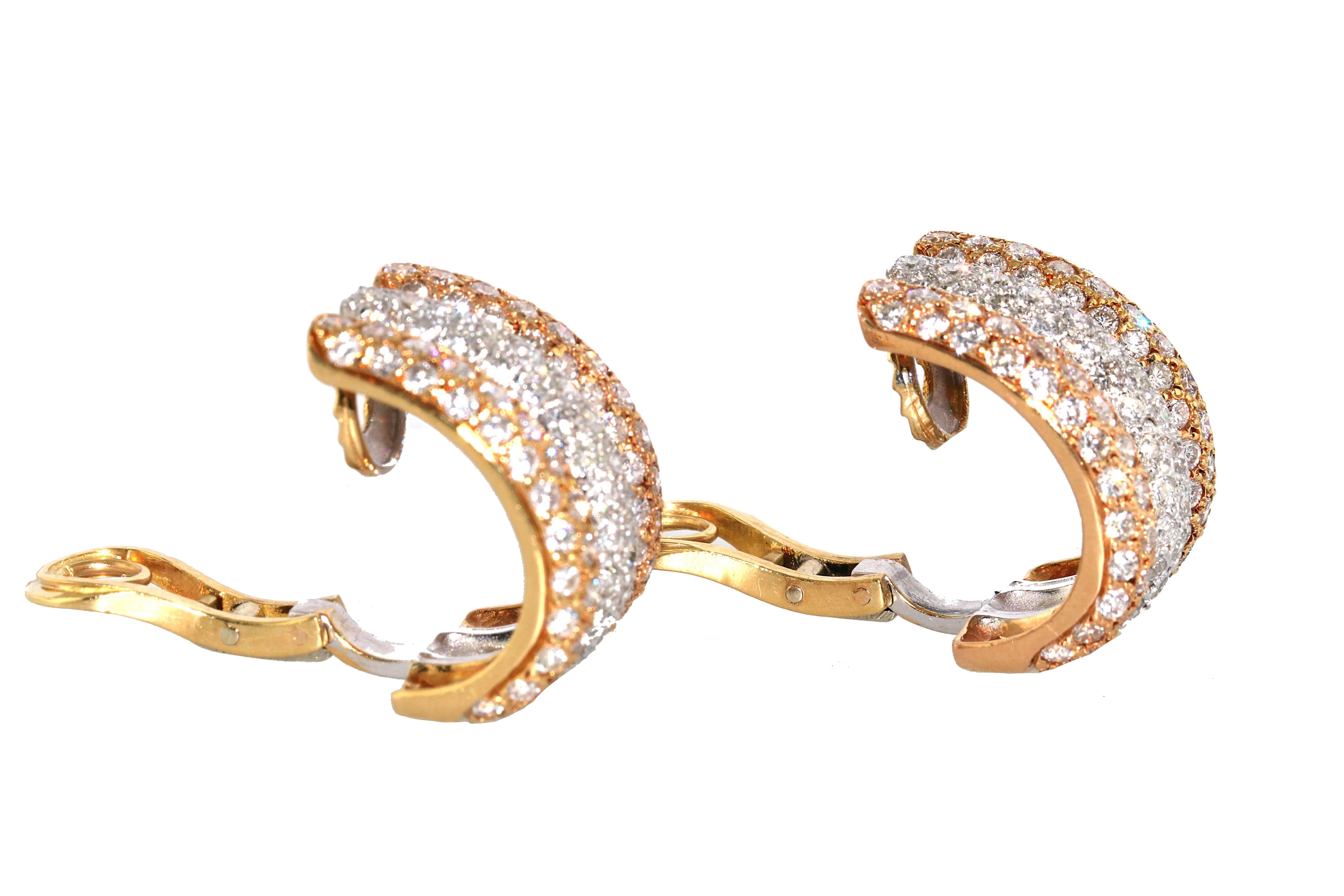 Gorgeous diamond huggie earrings with 3 colors of gold. White, yellow and rose gold adorned with round diamonds. 240 diamonds weighing an approximately 4.80 carats. 