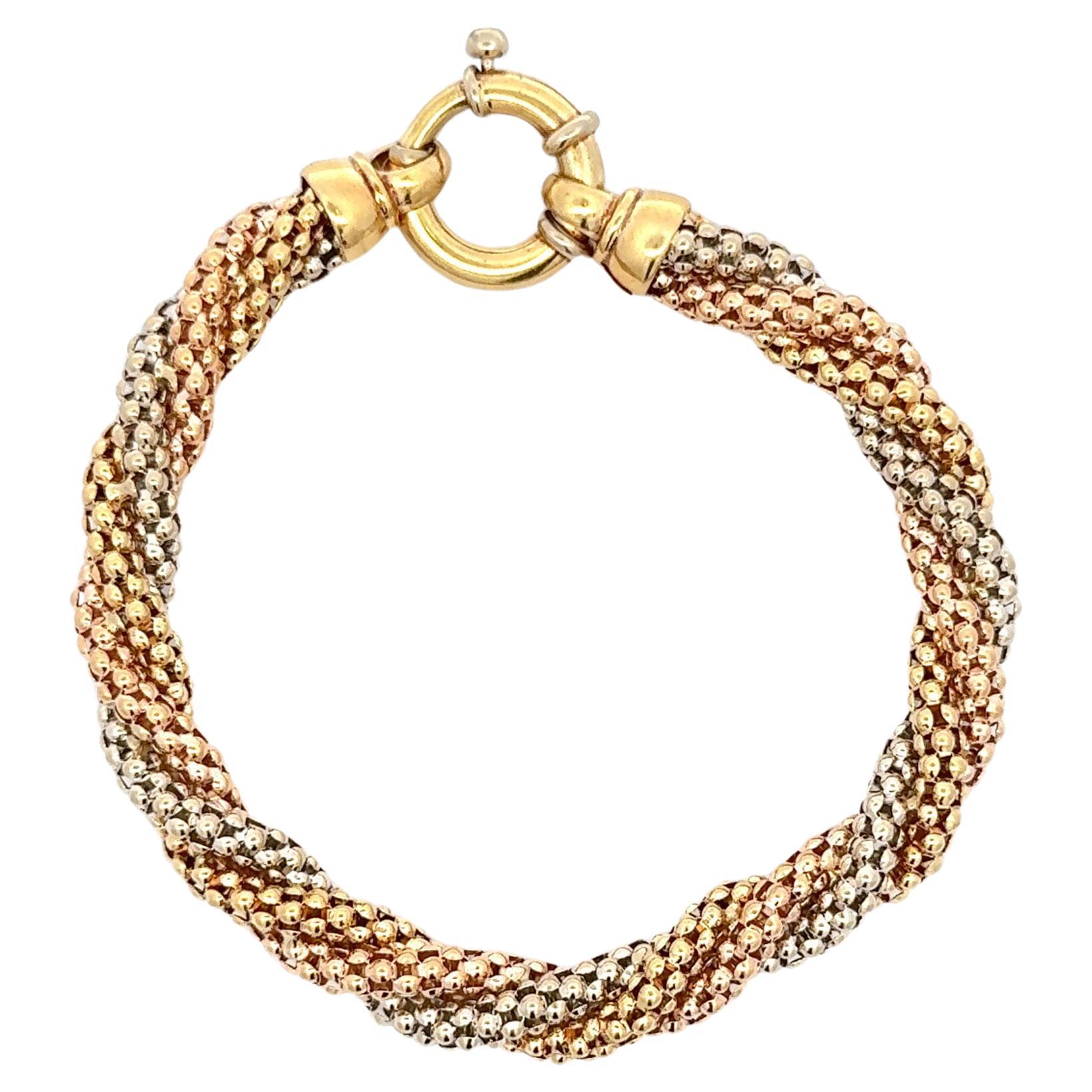 Bracelet torsadé en or 18 carats et perles tricolores 23 grammes en vente
