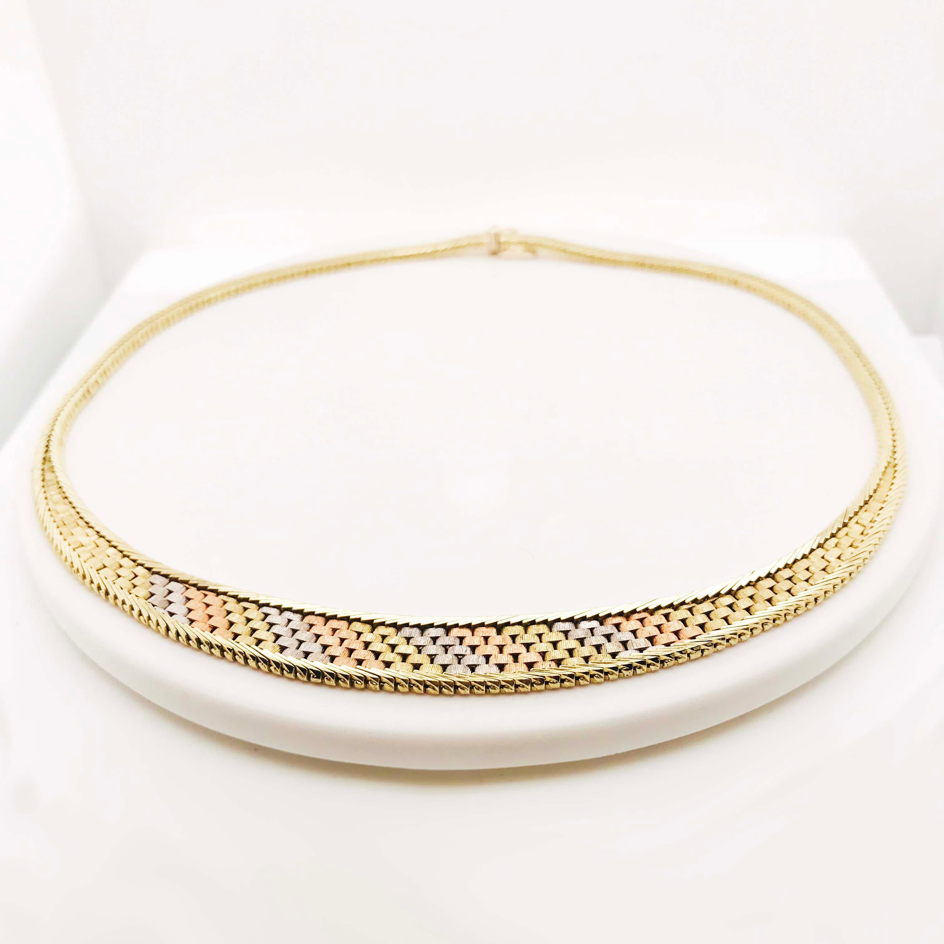 This Tri Colored Gold Choker Chain Necklace is classy and elegant! With 14 Karat Yellow, rose and white gold links that have all been hand fabricated and designed together to form this gorgeous statement necklace. The links have been designed in a