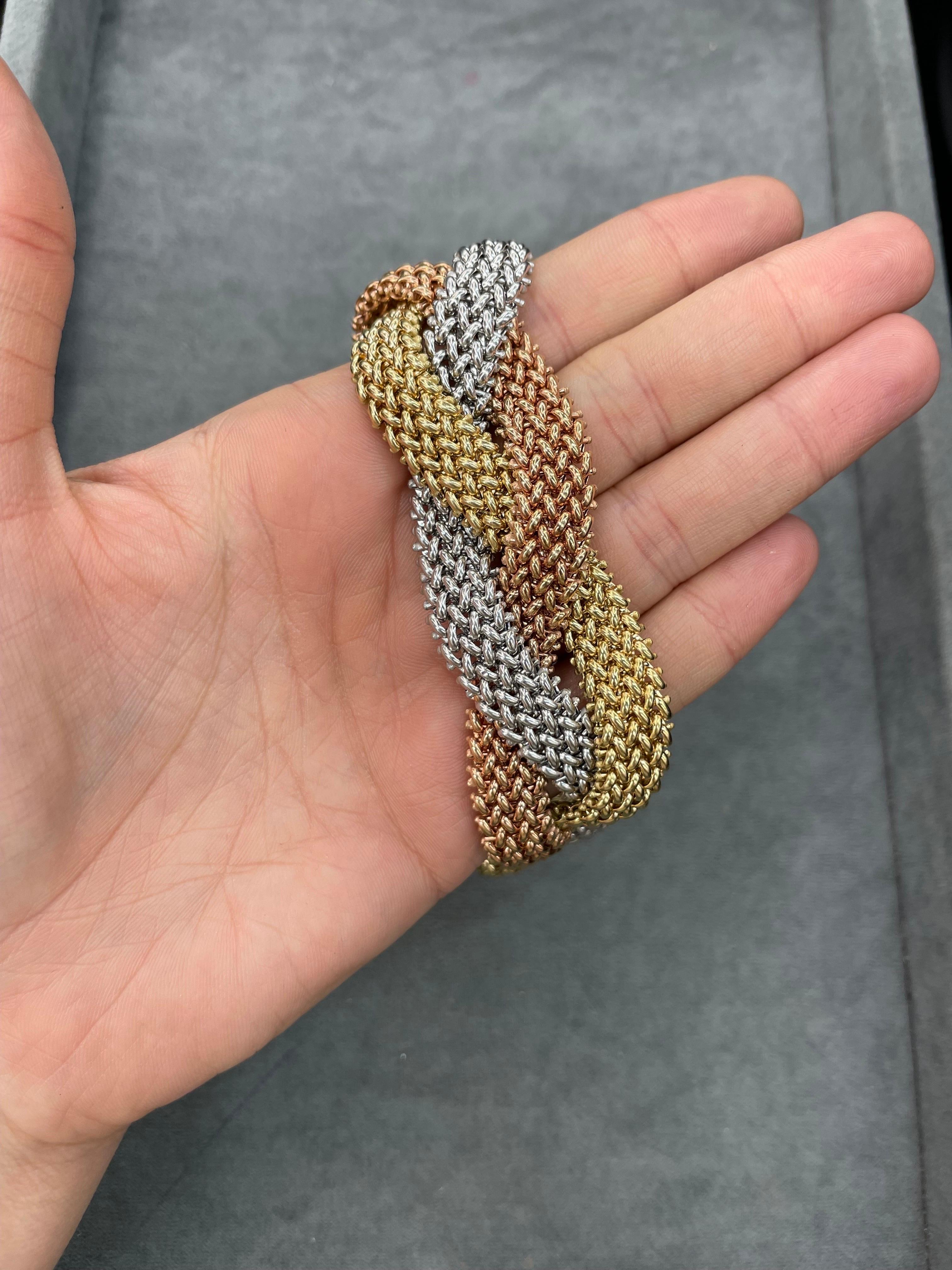 Tri-Color Gold Woven Braided Bracelet 14 Karat Gold 42.6 Grams Diamond Clasp  In Excellent Condition For Sale In New York, NY