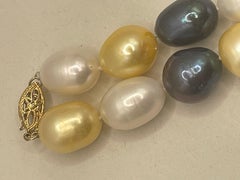 Tri-Color South Seas Tahitian pearls Golden Cream Black extra large pearls