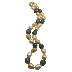Tri-Color South Seas Tahitian pearls Golden Cream Black extra large pearls