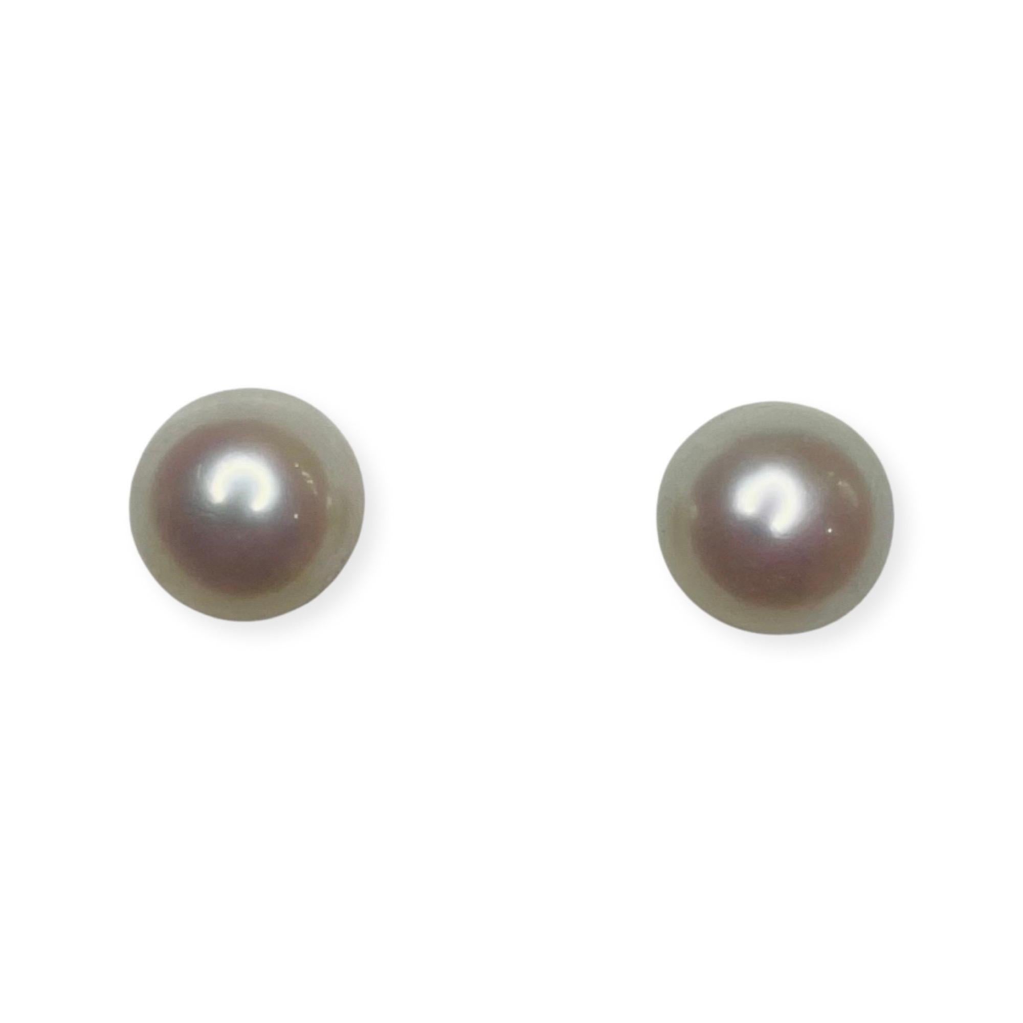 Tri Gem 18K White Gold Cultured White South Sea Pearl Earrings. The Pearls are 10.5 mm. The pearls are slightly off round with medium luster and slight blemishes. They come 14K gold backs imbedded in silicone. 400-30-797 