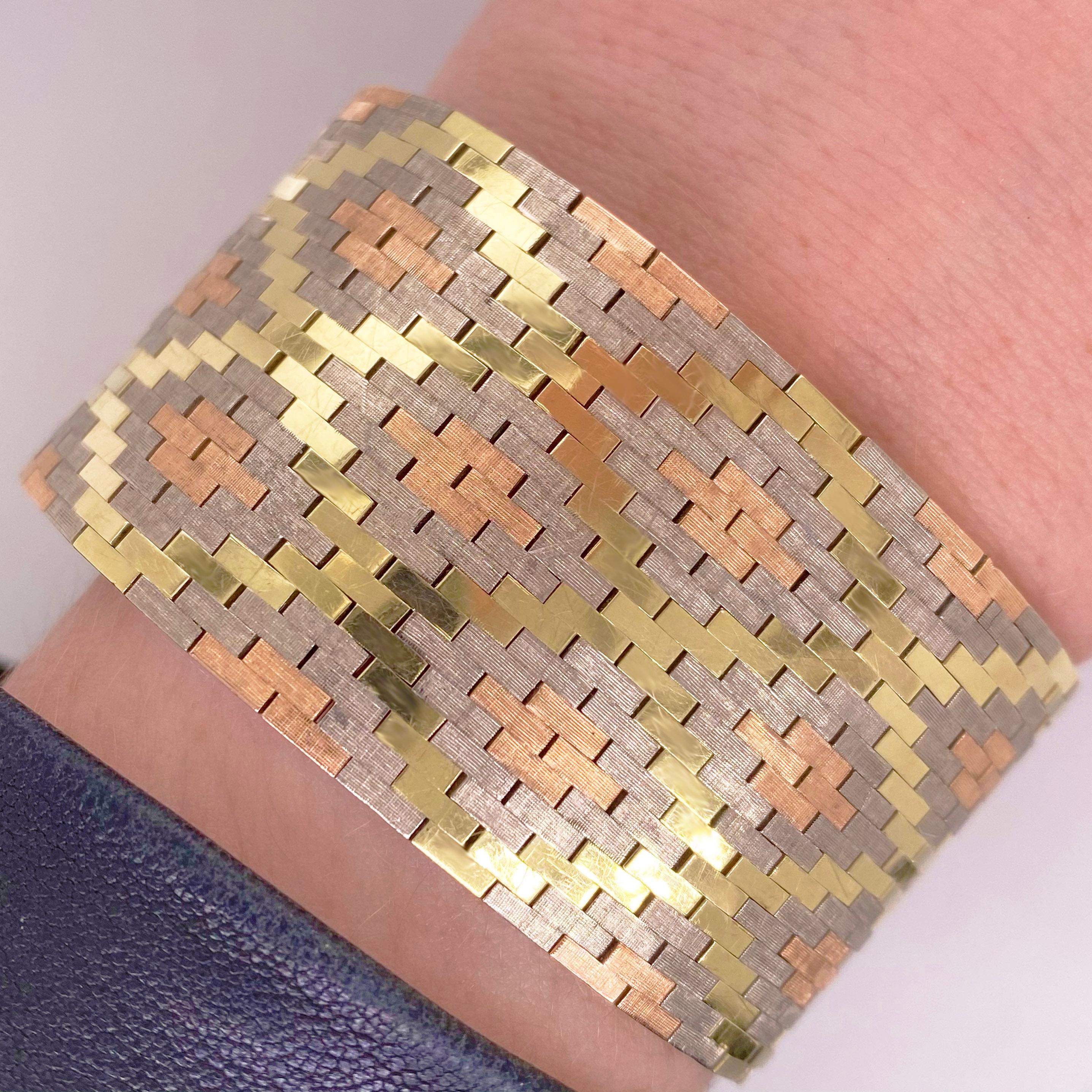  TRI-GOLD Estate Bracelet-made like butter!

This estate piece is a flexible bracelet that lays perfectly on any wrist with a timeless pattern that is still promenade in today's fashion. The bracelet has three natural gold colors made with 14 karat