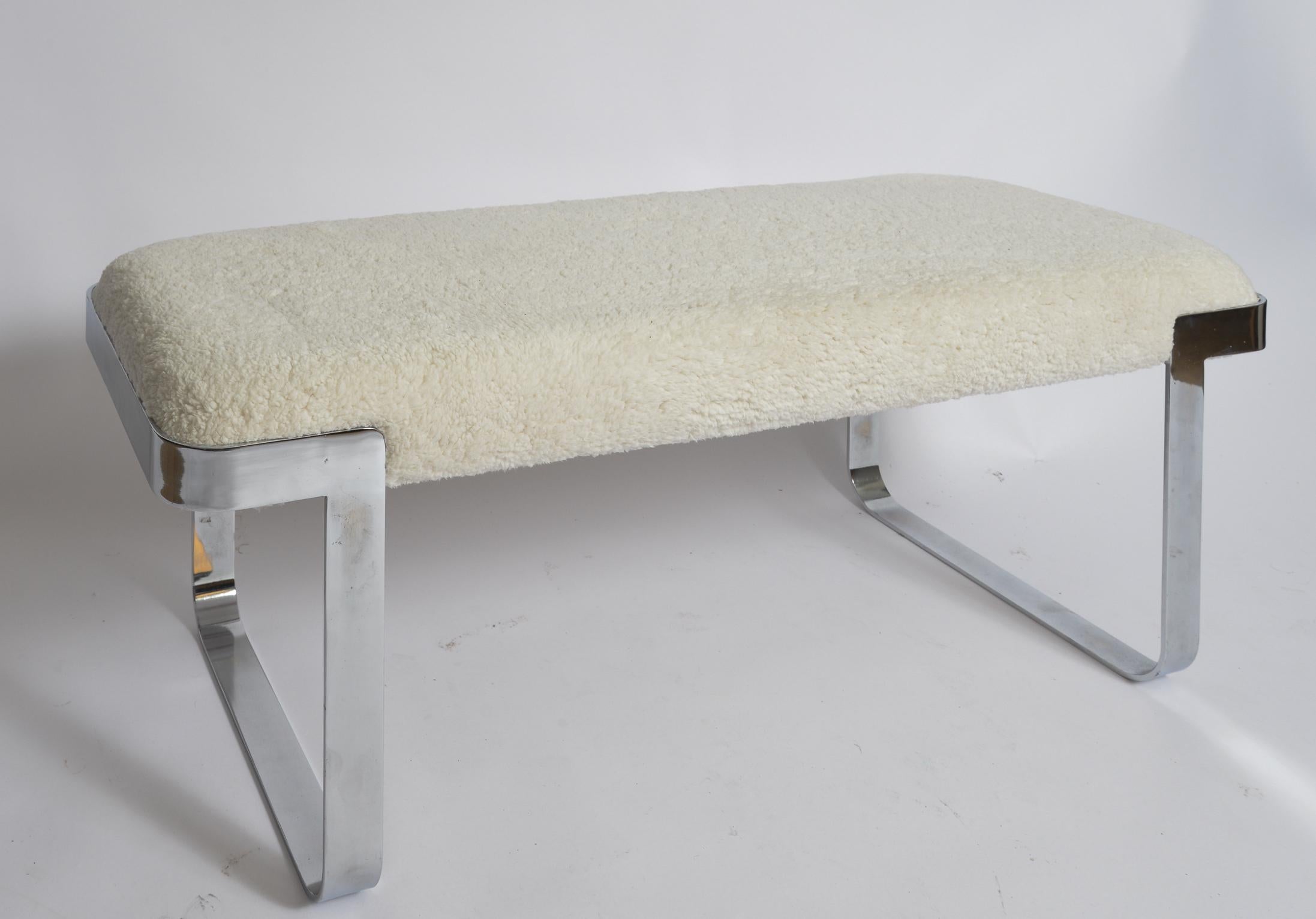 Tri Mark Chrome-Plated Steel and Upholstered Bench
Clean Metal surface
Re-Upholstered in faux sheerling