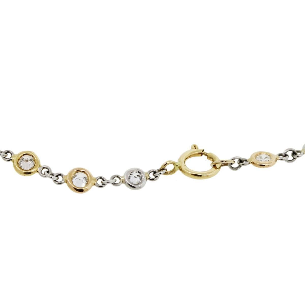 Material: Platinum, 18k rose gold and 18k yellow gold
Diamond Details: Approximately 4.31ctw of round brilliant diamonds. Diamonds are H/I in color and SI in clarity
Necklace Measurements: 23.25″
Clasp: Spring ring clasp
Total Weight: 9.3g