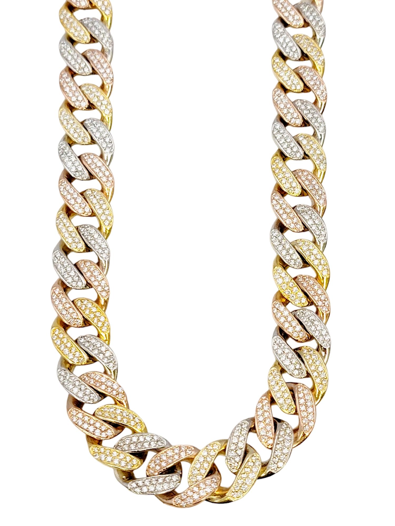Impressive unisex cuban link necklace with glittering pave diamonds. The wide, tri-toned links hug the neck for a comfortable and secure fit, while the shimmering diamonds sparkle from all angles. 

This striking necklace features chunky cuban links