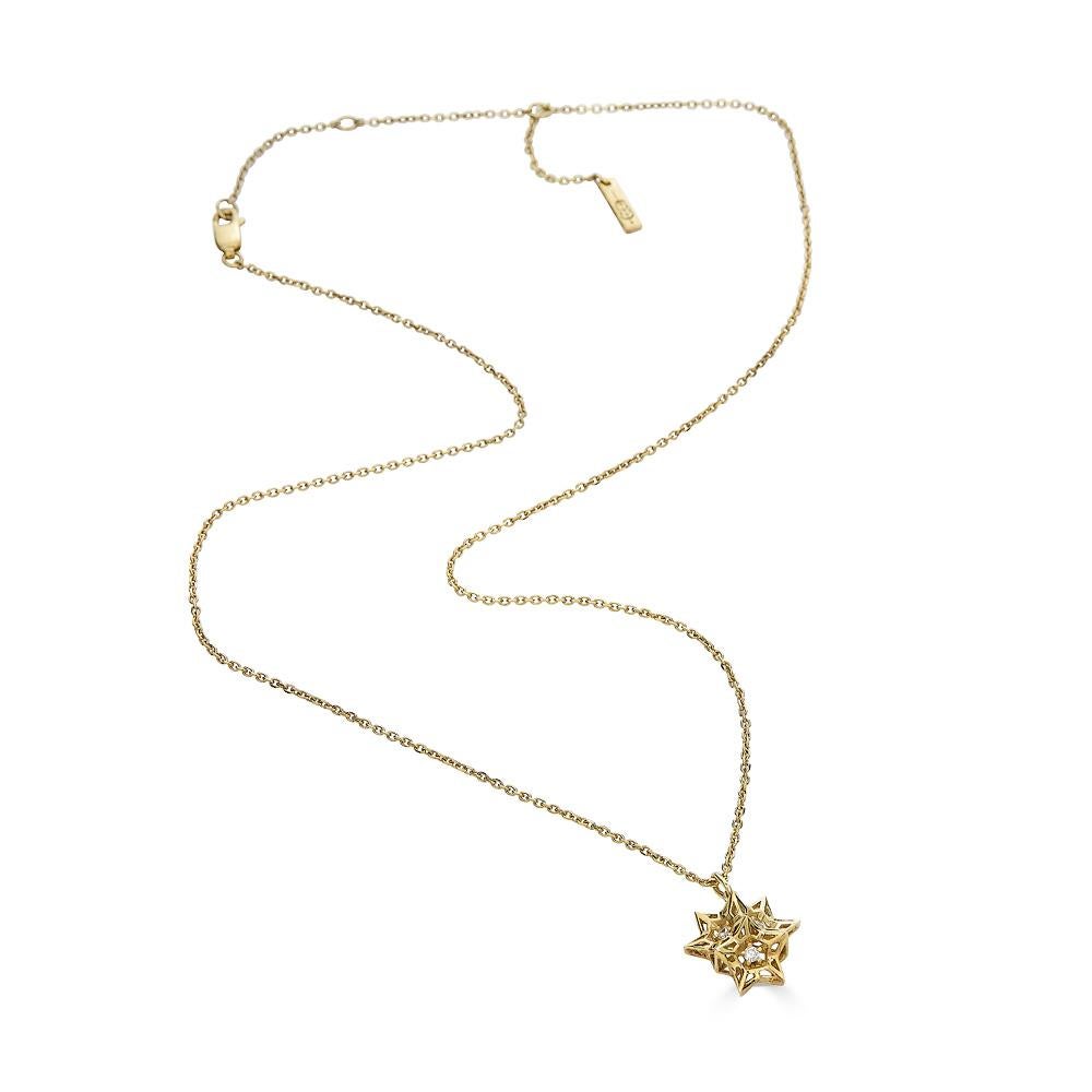 This limited edition, Tria Frame Diamond and 18K Gold Necklace is an embodiment of monumental power and strength.  This 18K yellow gold necklace features sacred geometric forms and evokes personal power. This necklace is part of designer John
