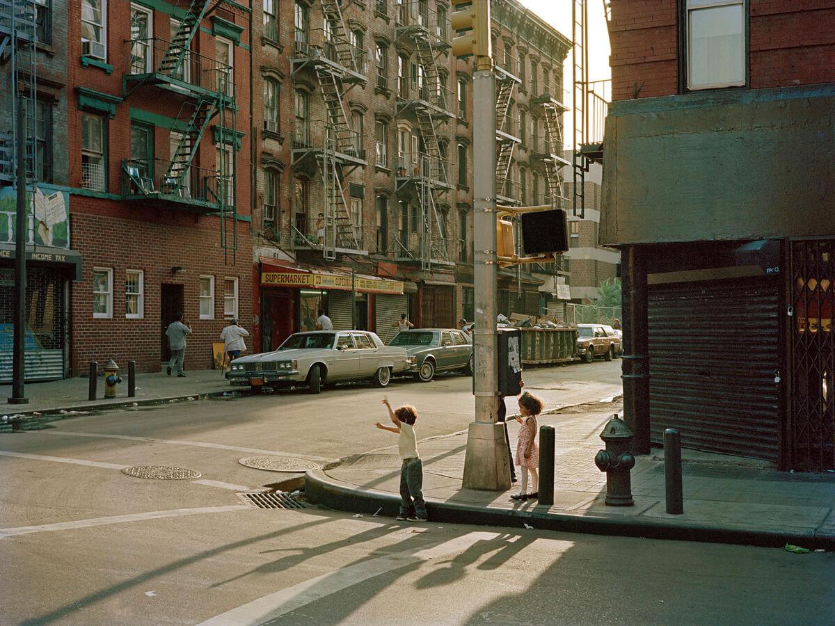 Children on Clinton Street, 1986

From a 6cm x 4.5cm negative, scanned in 2020

Archival Pigment Print available in this size of 16" x 20" in an Edition of 12 with 3 Artist Proofs

Print size 16" x 20"
Image size 13.5" x 18"

In 1984, Tria Giovan
