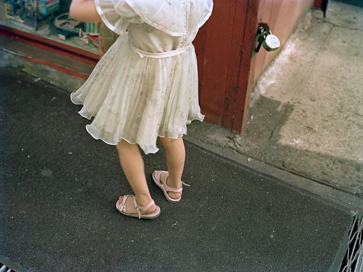 Pink Sandals on Clinton Street, 1986

From a 6cm x 4.5cm negative, scanned in 2020

Archival Pigment Print available in this size of 16" x 20" in an Edition of 12 with 3 Artist Proofs

Print size 16" x 20"
Image size 13.5" x 18"

In 1984, Tria