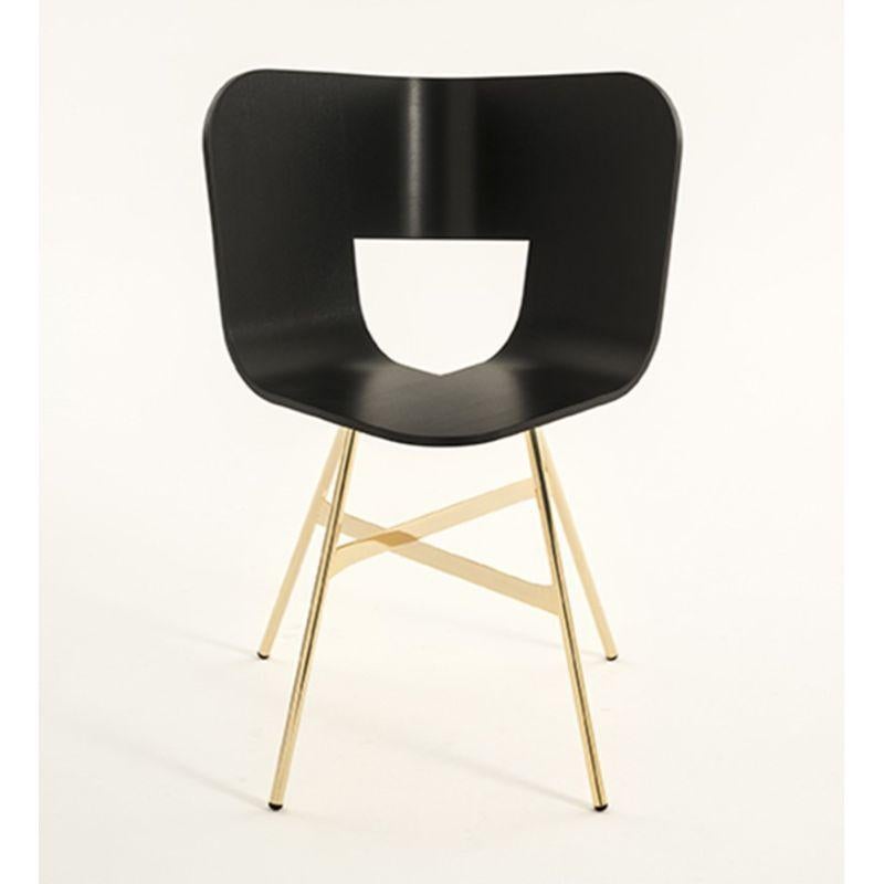 Tria gold 4 legs chair, black open pore seat by Colé Italia with Lorenz & Kaz (2019)
Dimensions: H 82.5, D 52, W 61 cm.
Materials: Plywood chair with 4 metal legs in 3 possible finishing: black, golden, chrome.

Also available: Tria; 3 Legs,