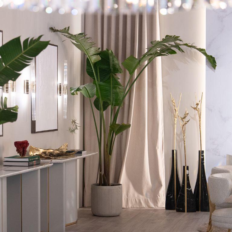 The Tria Sculpture is an extraordinary fusion of botanical poetry and refined craftsmanship, featuring hand-crafted tropical heliconias that rise gracefully from a base of Nero Marquina marble. Its striking contrast between the deep, dramatic