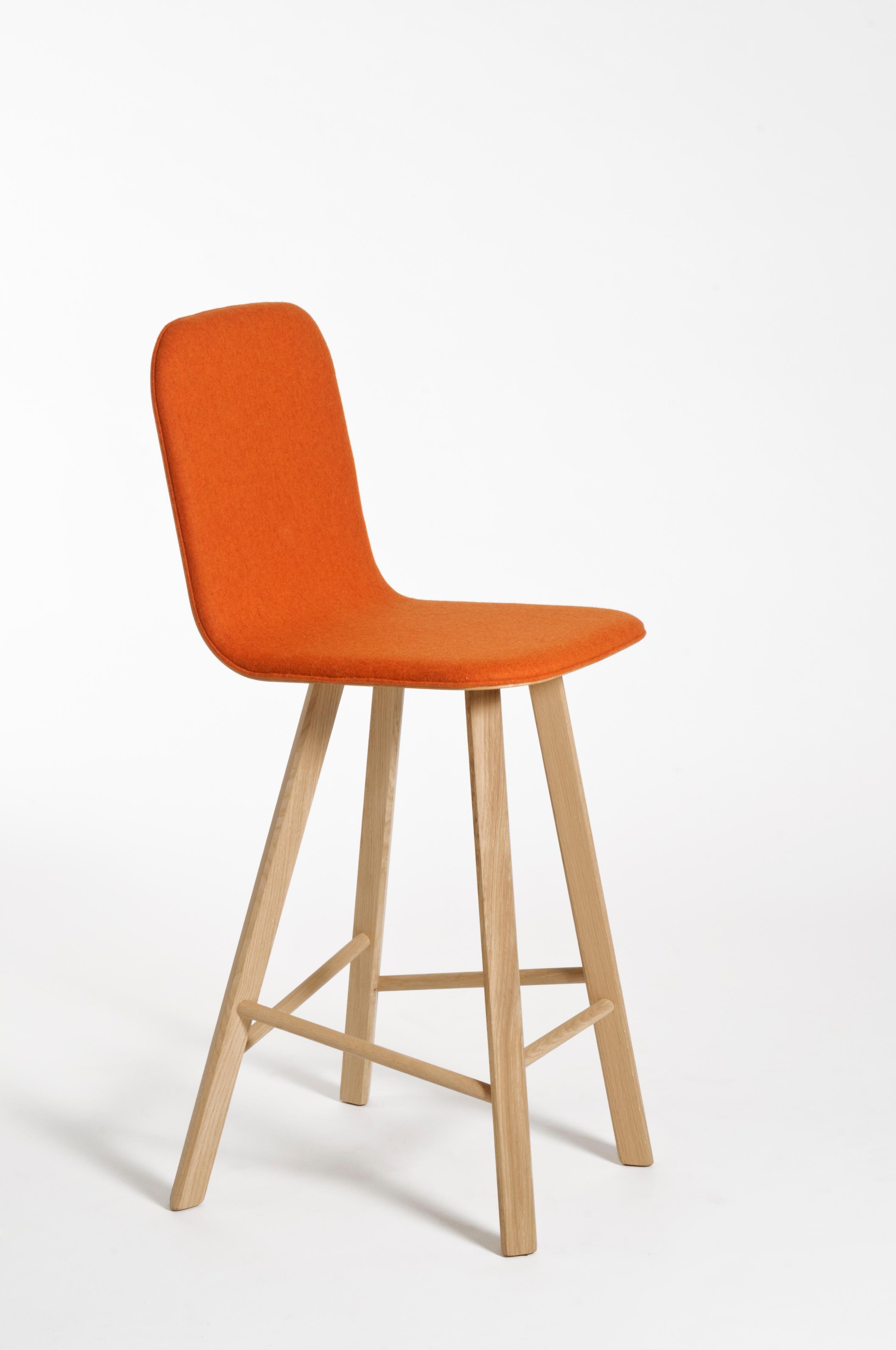 Essential and elegant minimalist stool with a bent plywood shell and four iconic legs with triangular shape in solid oak, joined by transversal wooden bars. The seat can have High Back as listed, for a very comfortable long time seating, or Low Back