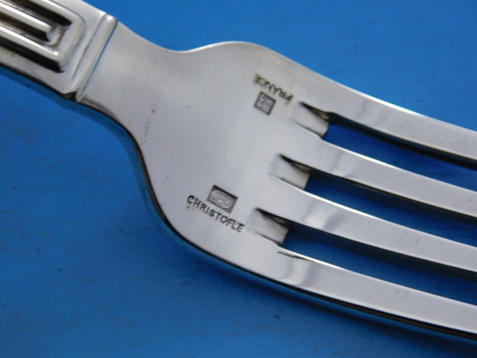 Modern clean lines in a Classic column motif makes this pattern, Triade, forever timeless. 
Dinner Size Triade by Christofle France Silverplated flatware set - 96 pieces. This set includes:

12 Large Dinner Knives, 10