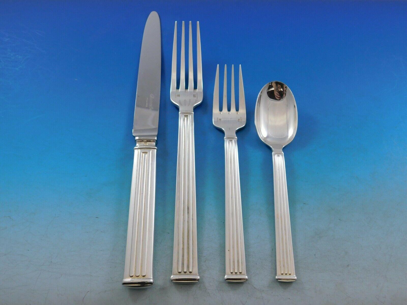 Modern clean lines in a Classic column motif makes this pattern, Triade, forever timeless. 
Desirable Dinner Size Triade by Christofle France Silverplated Flatware set - 41 pieces. This set includes:

8 Dinner Knives, 9 3/4