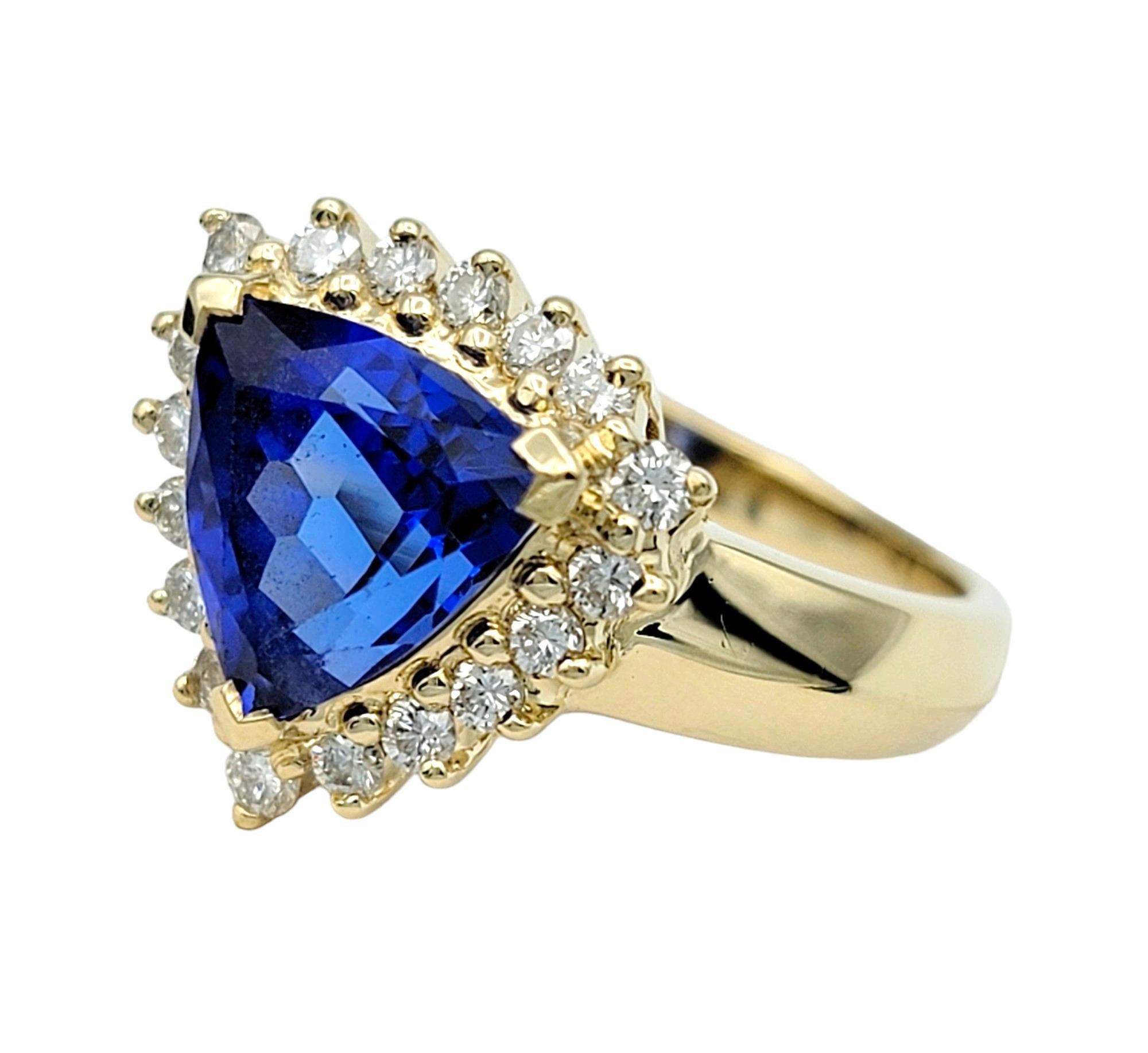 Contemporary Triangle Blue Tanzanite with Diamond Halo Cocktail Ring in 14 Karat Yellow Gold For Sale