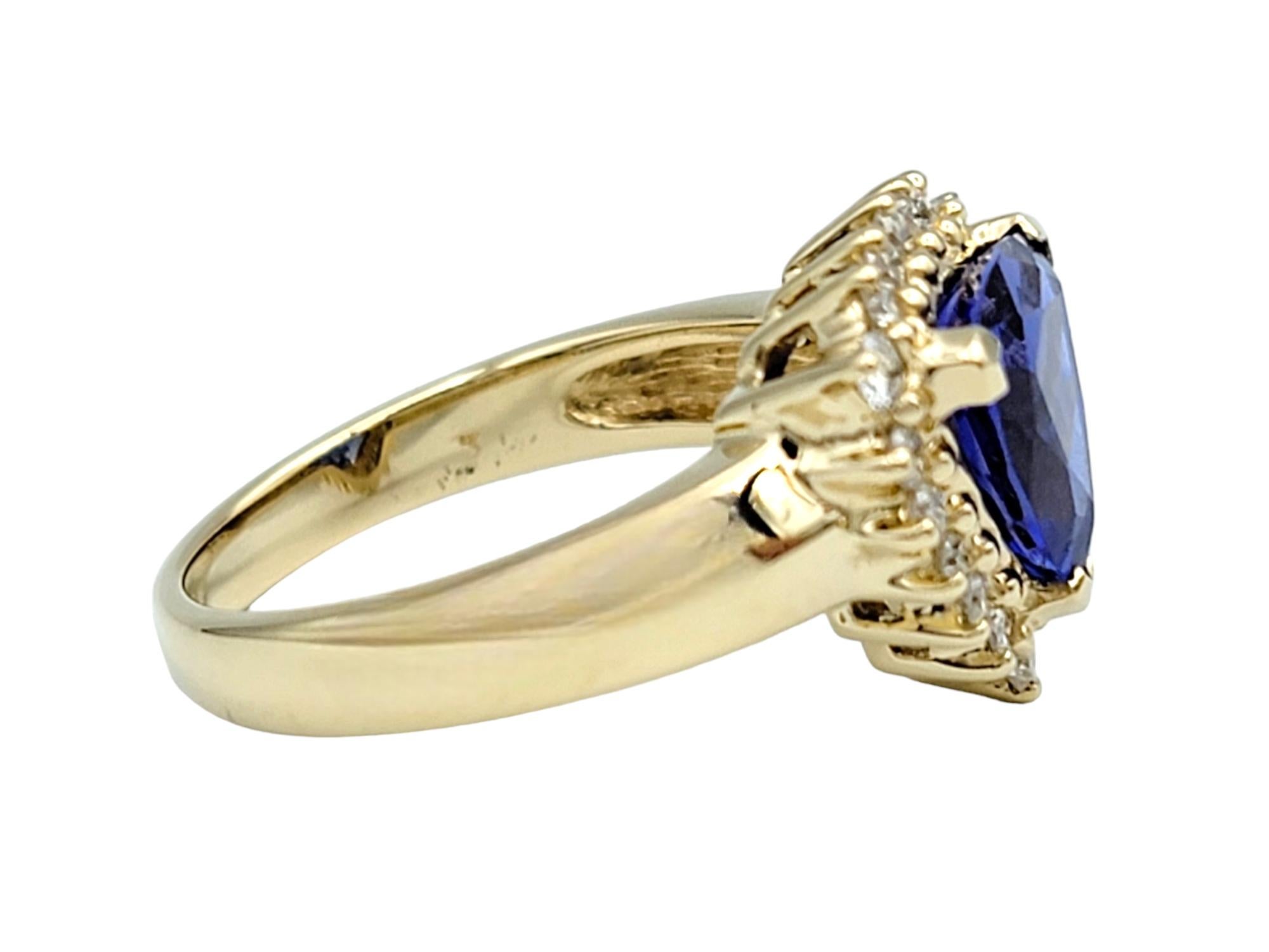 Trillion Cut Triangle Blue Tanzanite with Diamond Halo Cocktail Ring in 14 Karat Yellow Gold For Sale