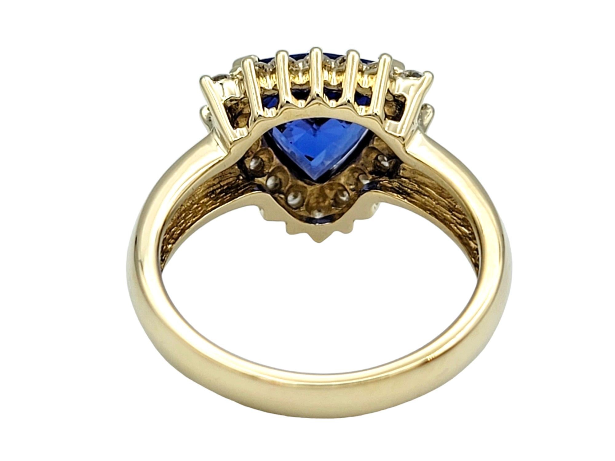 Triangle Blue Tanzanite with Diamond Halo Cocktail Ring in 14 Karat Yellow Gold In Good Condition For Sale In Scottsdale, AZ