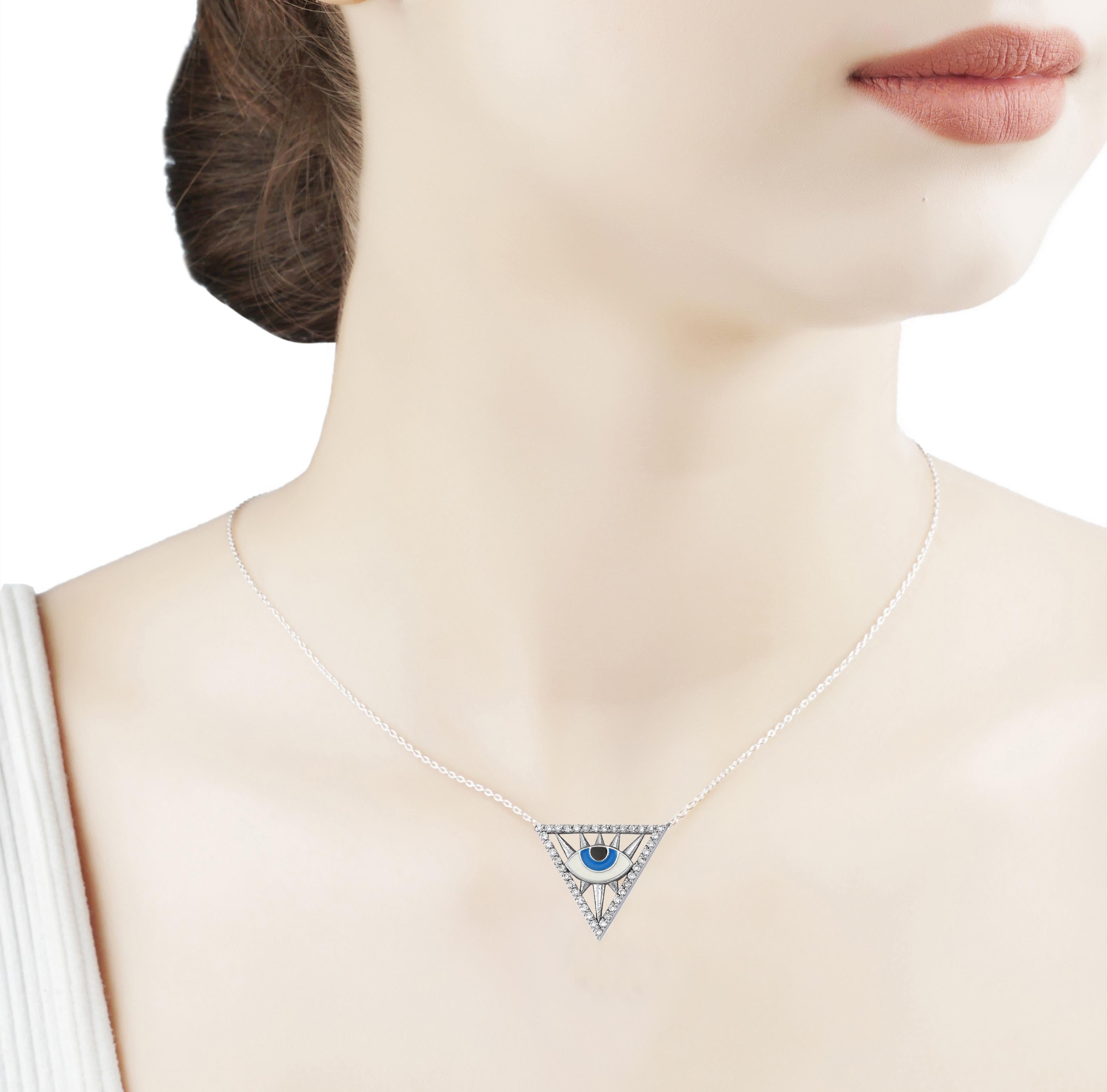 Eye See You! Triangle Pendant Necklace by Nazarlique Evil Eye Collection. 
18 Karat White Gold With Diamond Pavé and Enamel. 

Our Necklaces Will Take Your Breath Away. Each Evil Eye Model Will Add An Elegant Touch To Your Look and Protection,