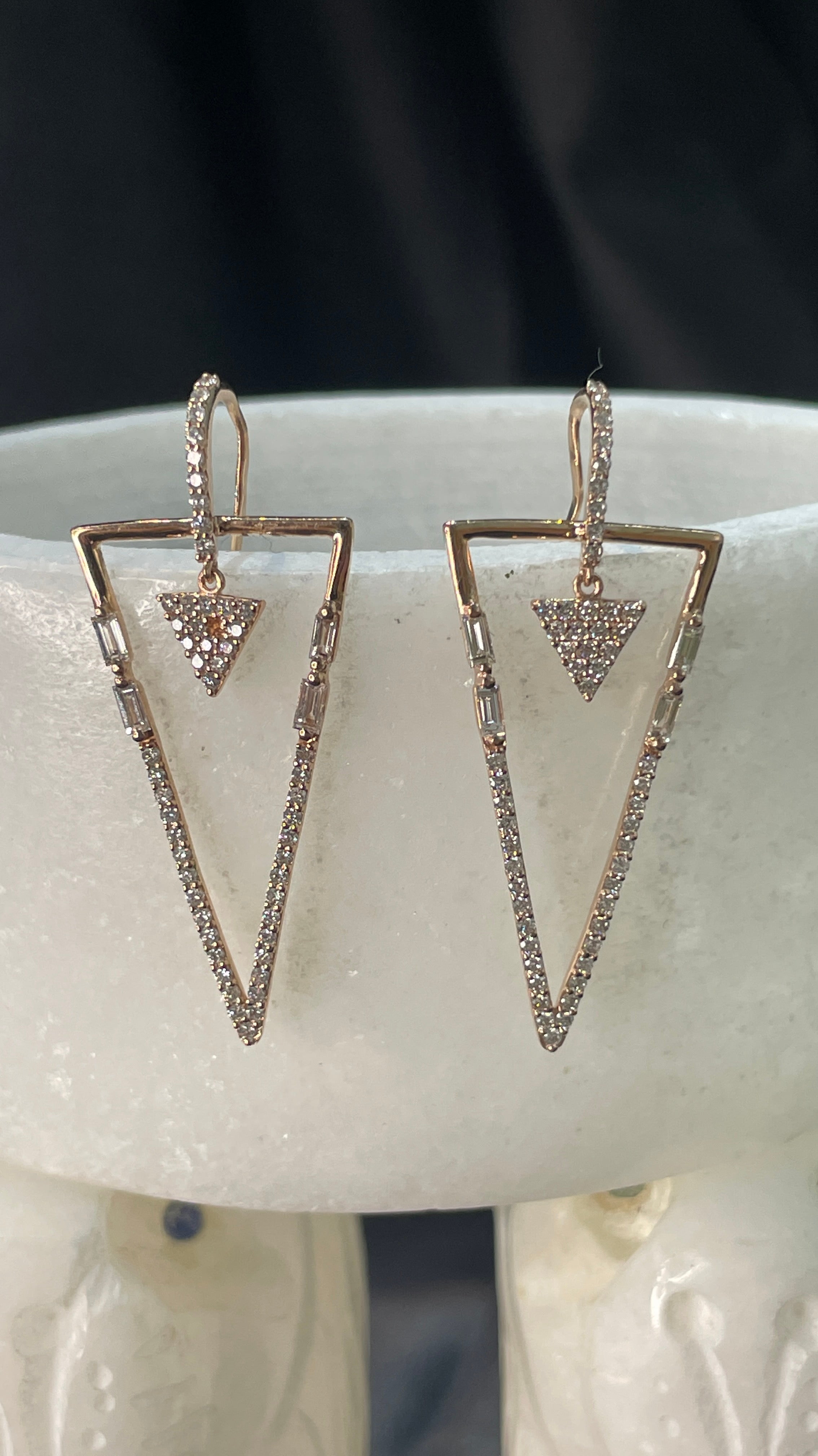 Modern Diamond Earrings in 14K Gold to make a statement with your look. You shall need dangle earrings to make a statement with your look. These earrings create a sparkling, luxurious look featuring round cut diamonds .
April birthstone diamond