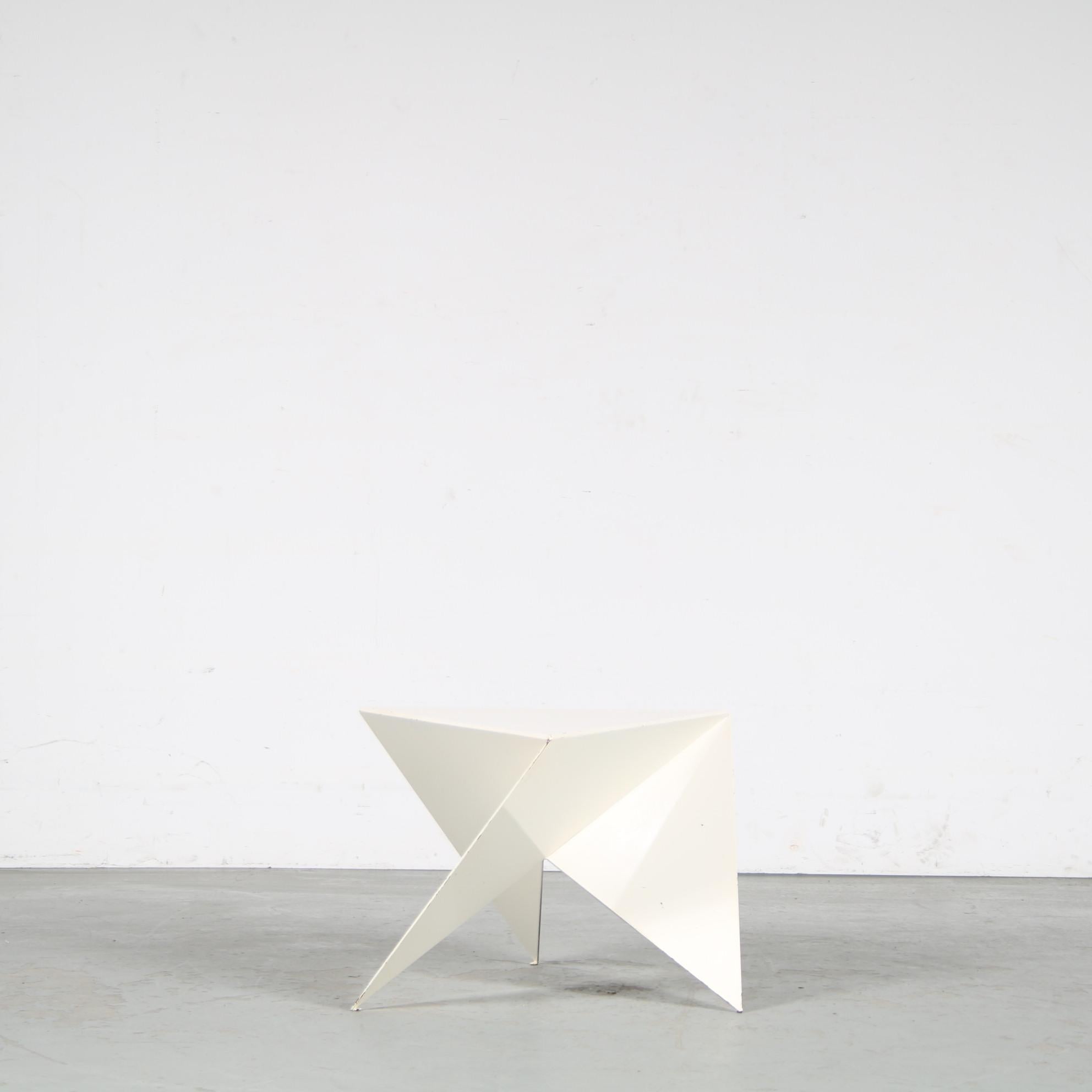 An eye-catching metal side table designed by Ronald Willemsen, manufactured by Metaform in the Netherlands around 1980.

The piece has a unique triangular, origami like shape. This makes the table a wonderful addition to the decor, adding a nice