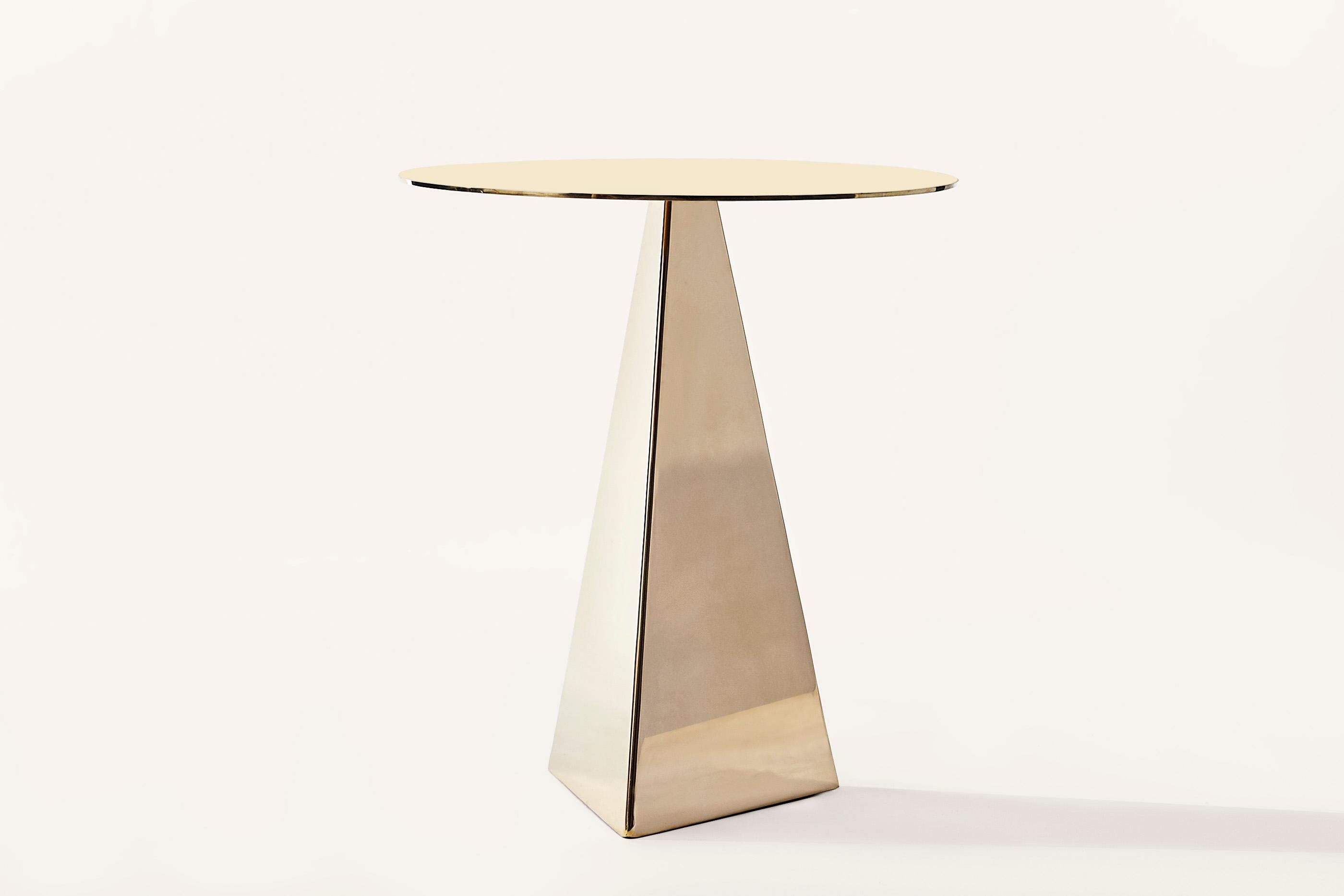 The Triangle Side Table is made from brass and is polished by hand. The high polish is left unlacquered as a live finish, in order to allow a beautiful, natural patina to develop over time.

Please inquire for custom dimensions or finishes. 

(1x)