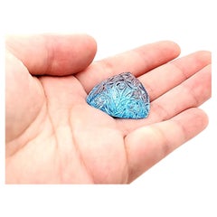 Triangular Blue Topaz Carving Cts 70.14