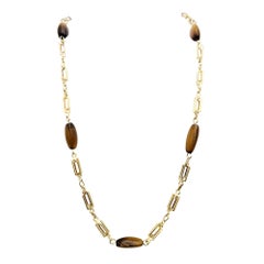 Collar Estación Cabujón Triangular Ojo de Tigre Cadena de Oro de 14 Kilates
