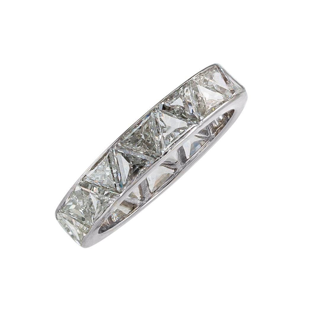Triangular cut diamonds and palladium eternity ring band circa 1950.  Clear and concise information you want to know is listed below.  Contact us right away if you have additional questions.  We are here to connect you with beautiful and affordable