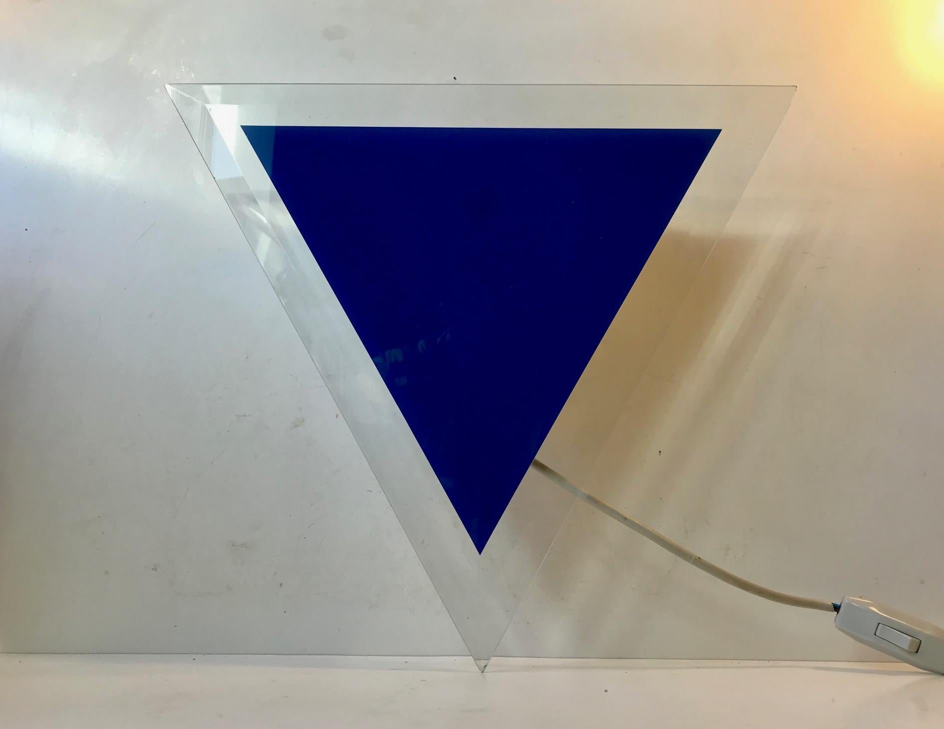 Large triangular sconce with glass front. Manufactured in Denmark during the early 1980s in a style reminiscent of Verner Panton.