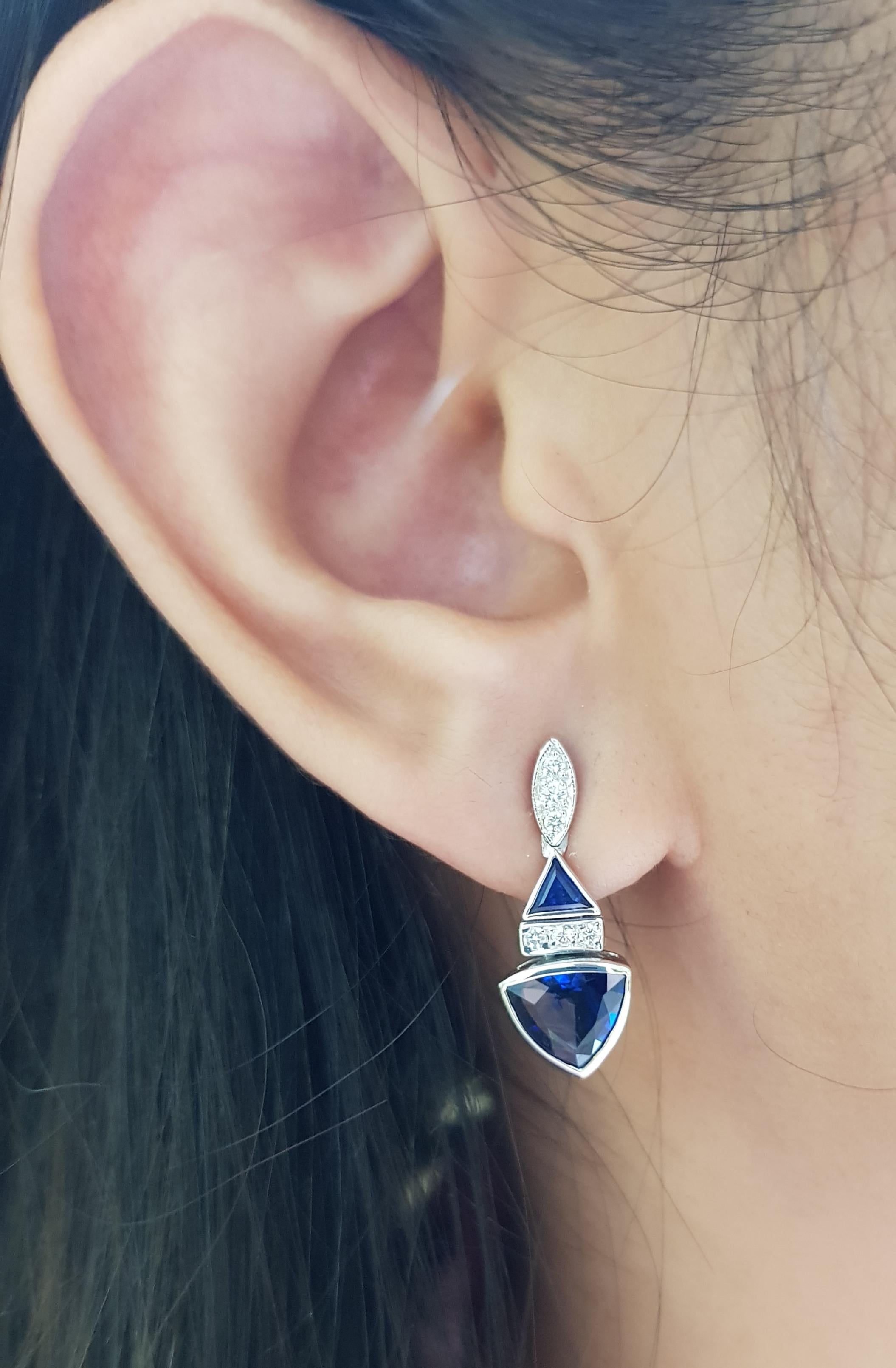 Blue Sapphire 2.61 carats with Blue Sapphire 0.81 carat and Diamond 0.32 carat Earrings set in 18 Karat White Gold Settings

Width:  0.9 cm 
Length: 2.2 cm
Total Weight: 4.92 grams

