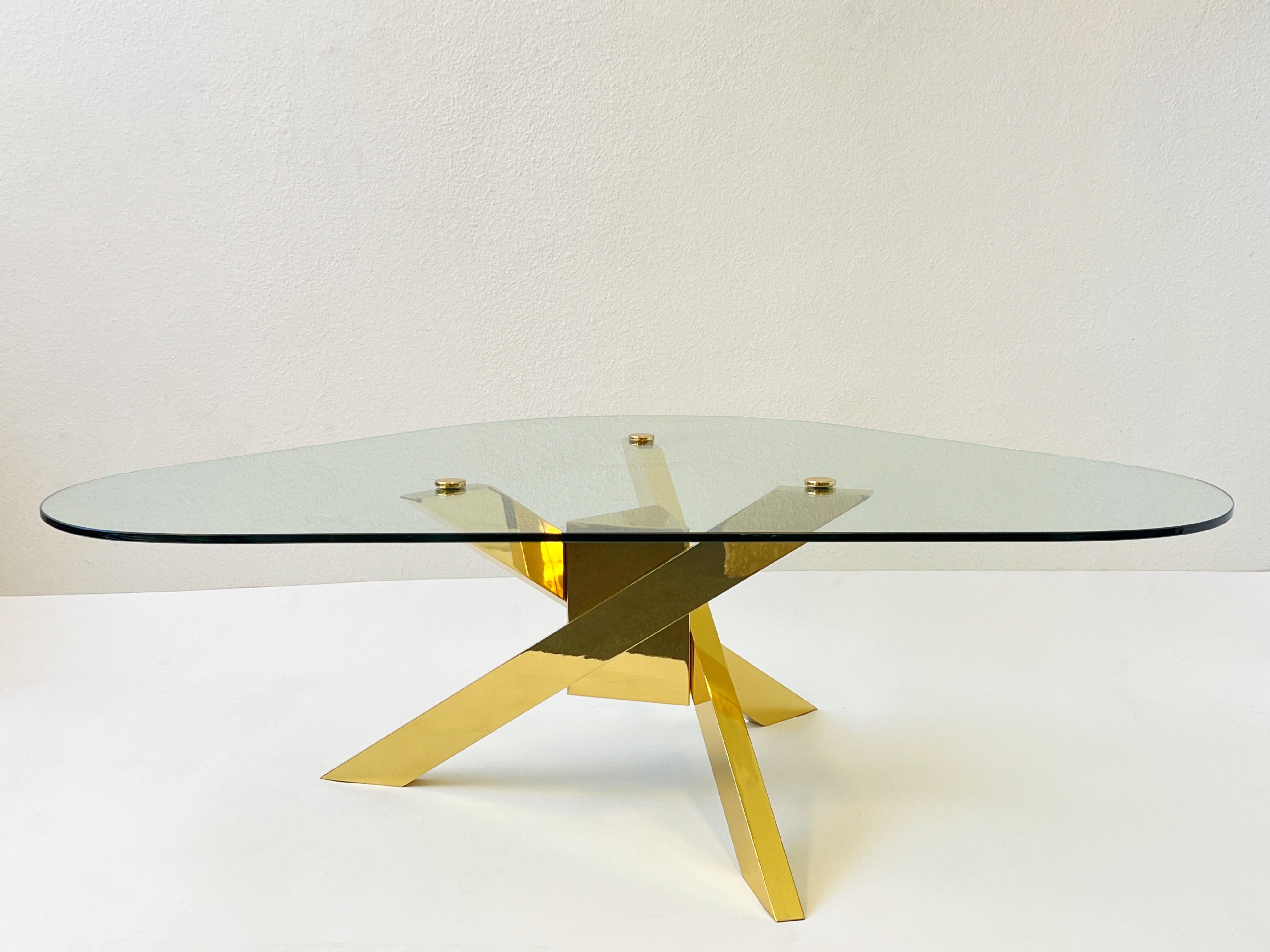 American Triangular Shape Glass and Brass Tripod Coffees Table For Sale