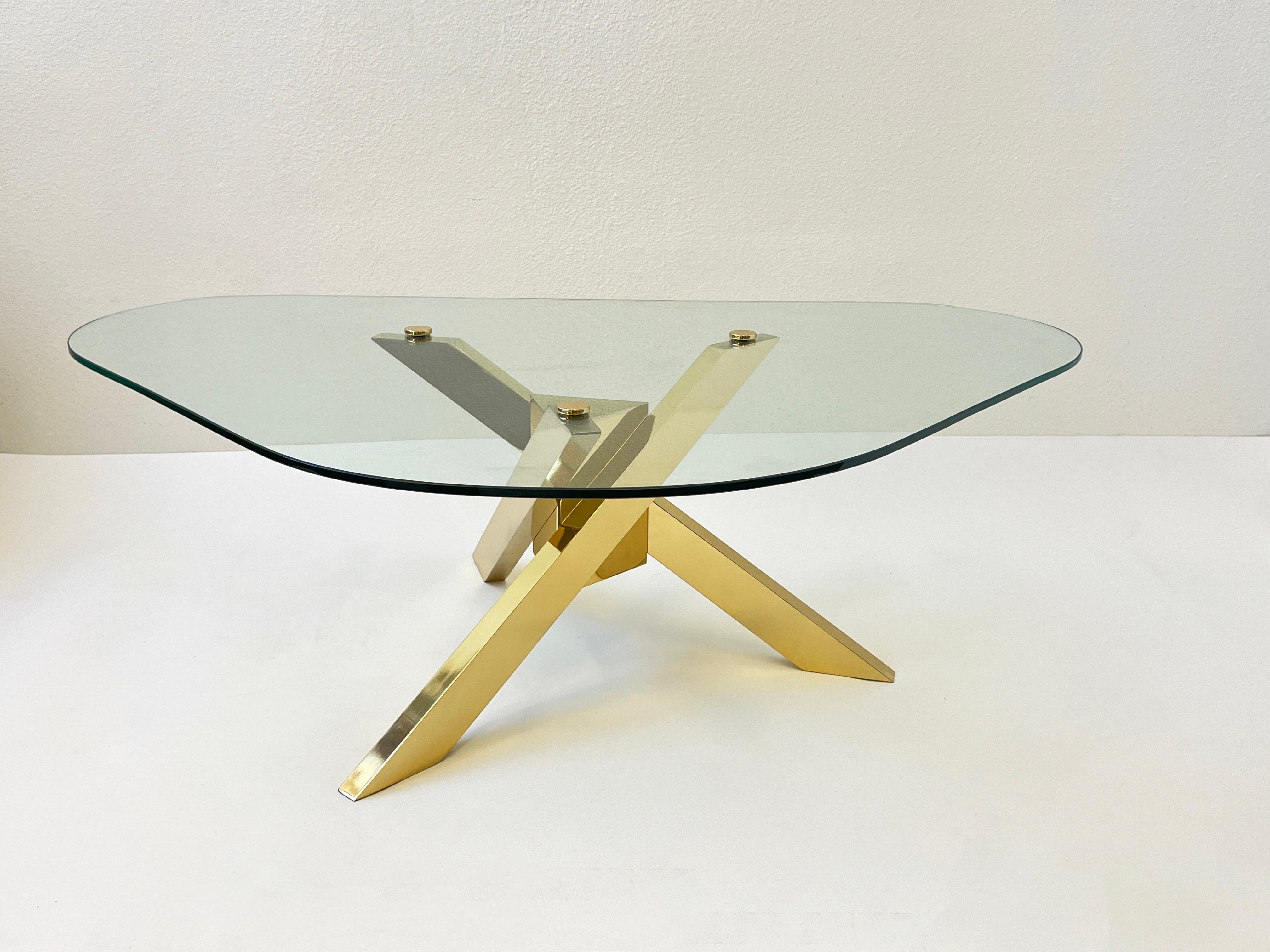 Triangular Shape Glass and Brass Tripod Coffees Table In Good Condition For Sale In Palm Springs, CA