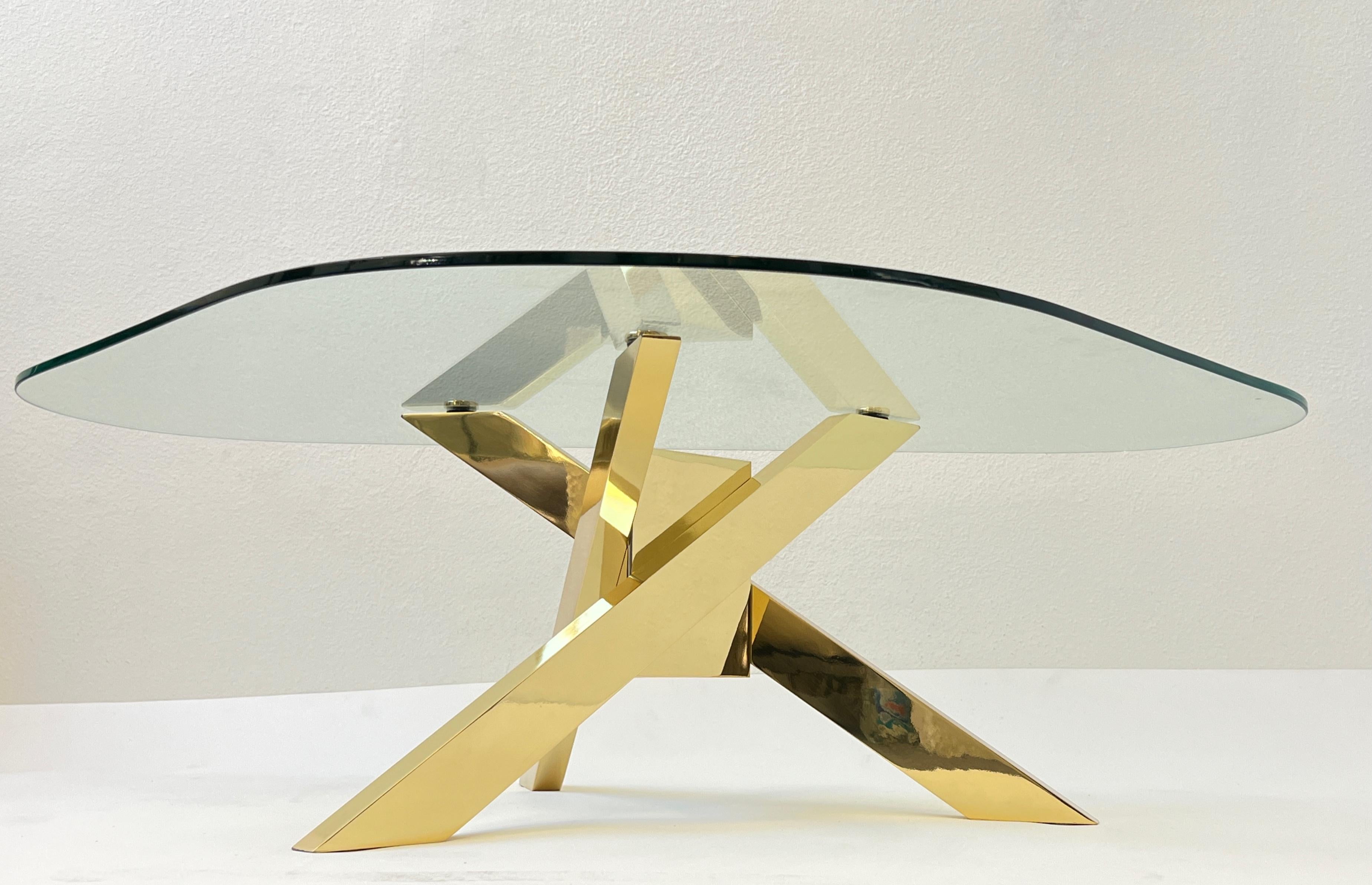 Late 20th Century Triangular Shape Glass and Brass Tripod Coffees Table For Sale