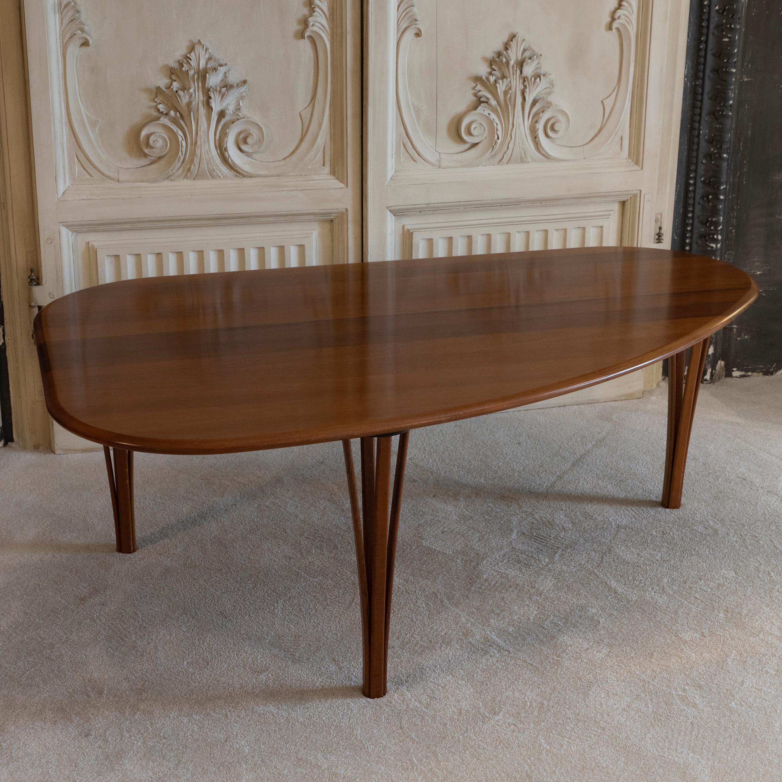 Triangular shape teak coffee table with three tapered legs with perfect vintage patina, few scratches on the top, by Severin Hansen, Denmark, circa 1950.